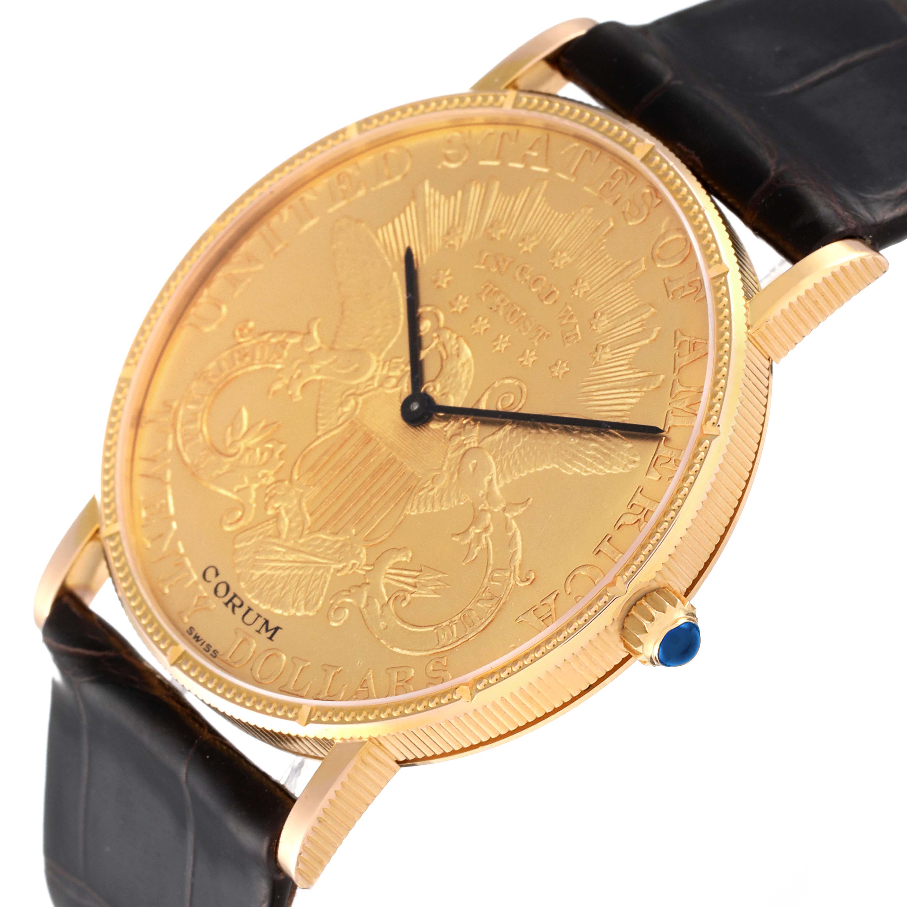 The image shows a Corum Coin Watch Men's Yellow Gold Black Dial Men's Yellow Gold Black Dial model from a slightly angled view, highlighting its gold face, black leather strap, and crown with a blue gem.