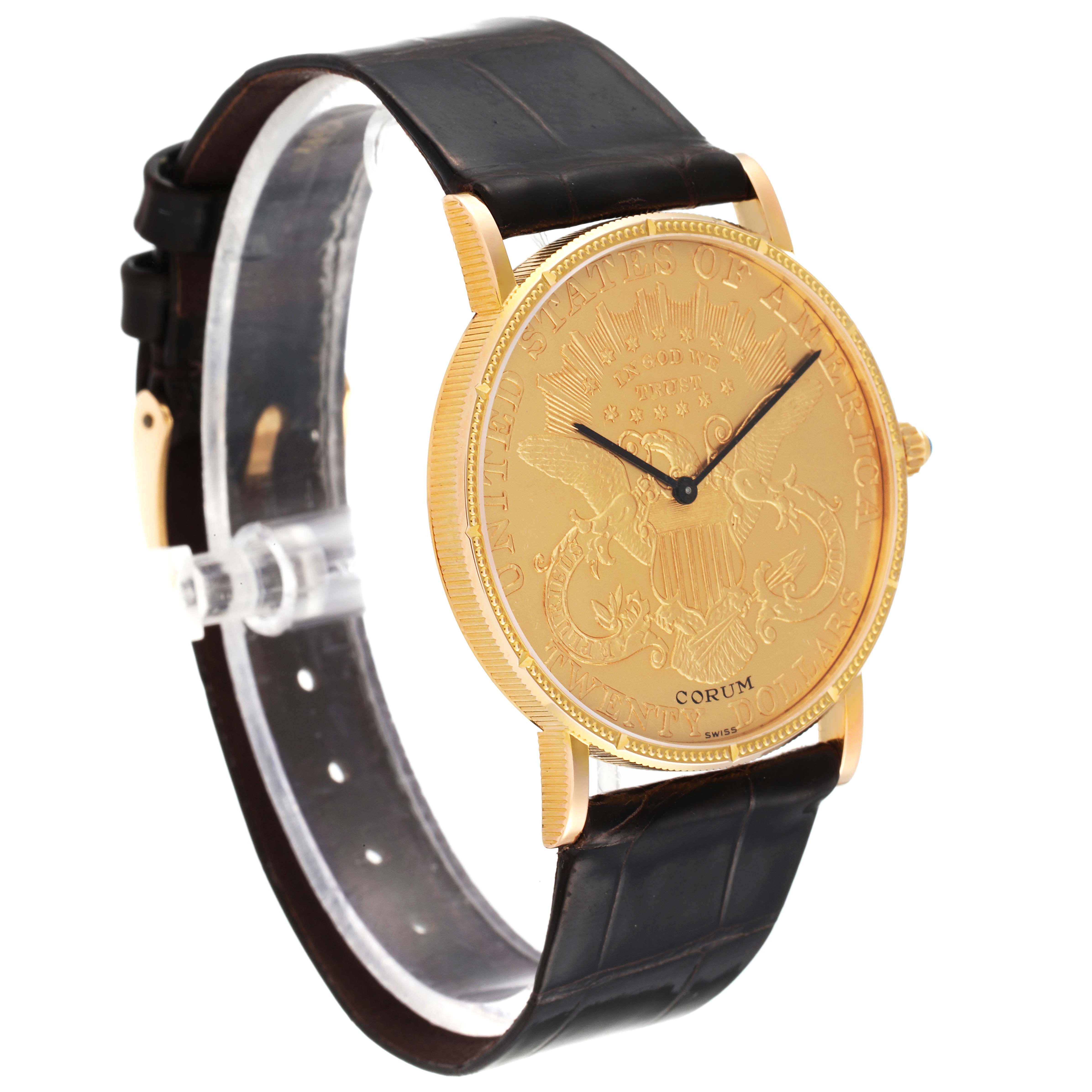 This image shows a Corum Coin Watch Men's Yellow Gold Black Dial Men's Yellow Gold Black Dial model from a side angle displaying the engraved dial, gold case, and black leather strap.