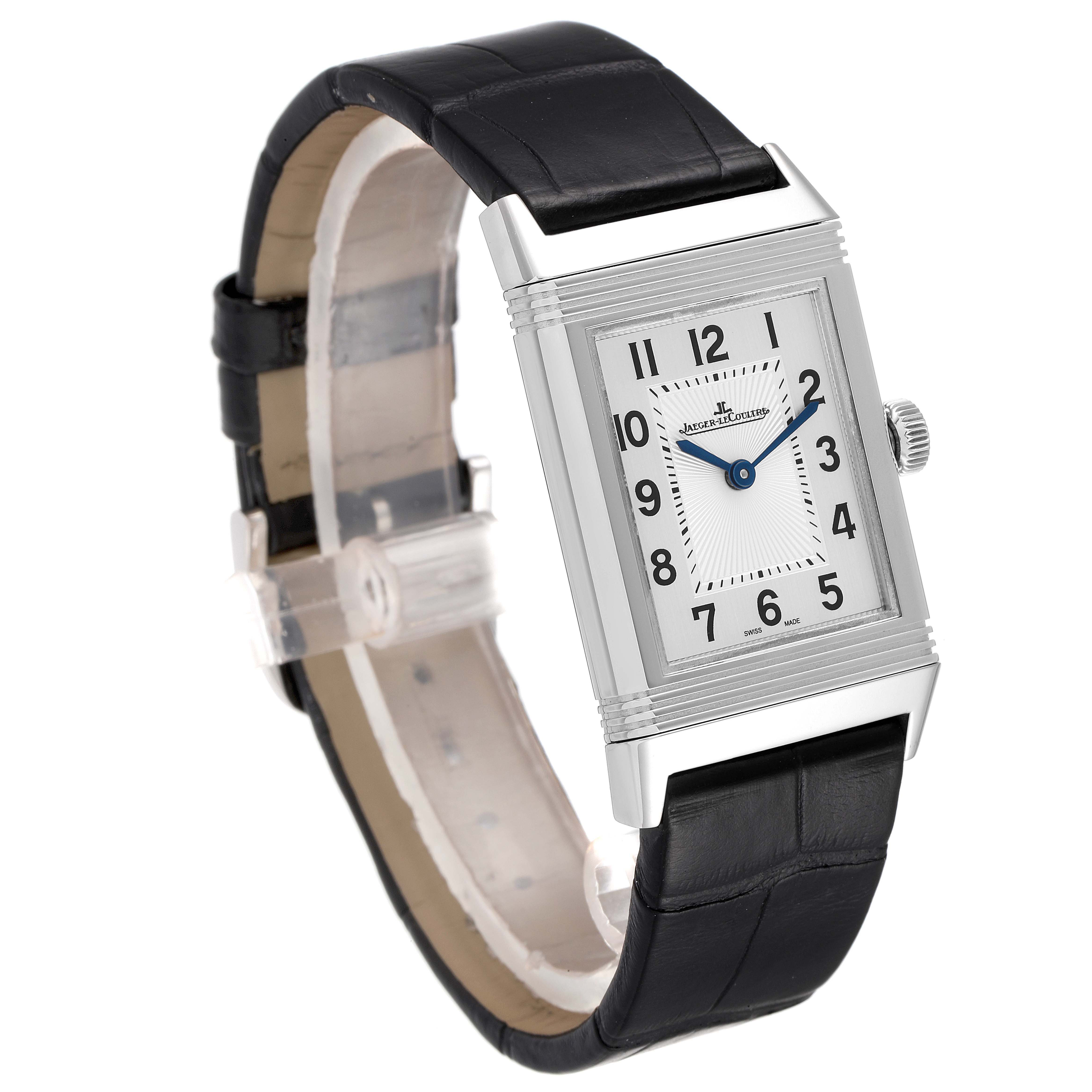 This image shows a Jaeger LeCoultre Reverso Q2548520 Men's Stainless Steel Silver Dial Q2548520 Men's Stainless Steel Silver Dial watch at a three-quarter angle, highlighting its face, case, strap, and crown.