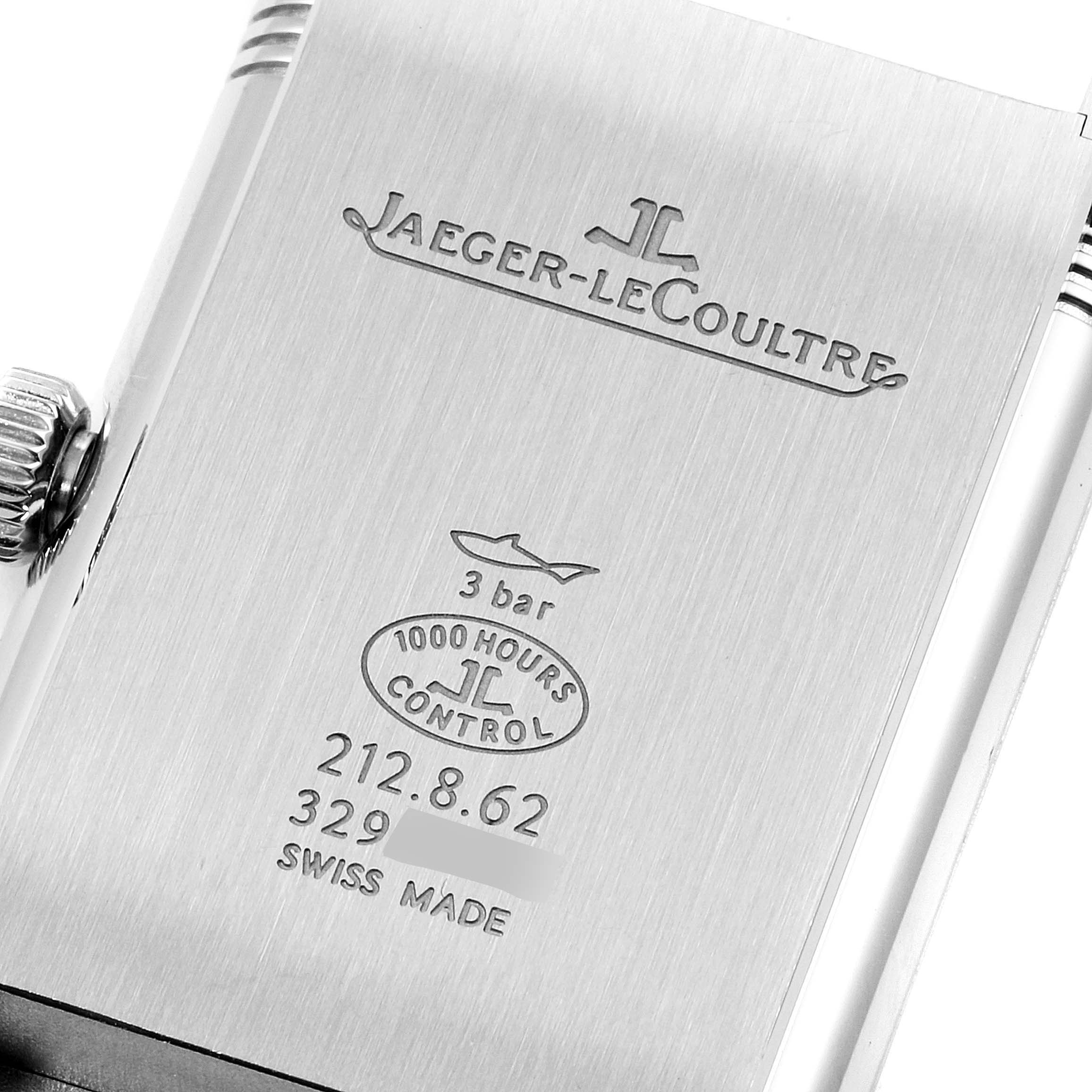 The image shows the case back of the Jaeger-LeCoultre Reverso watch, featuring the brand logo, model information, and water resistance details.