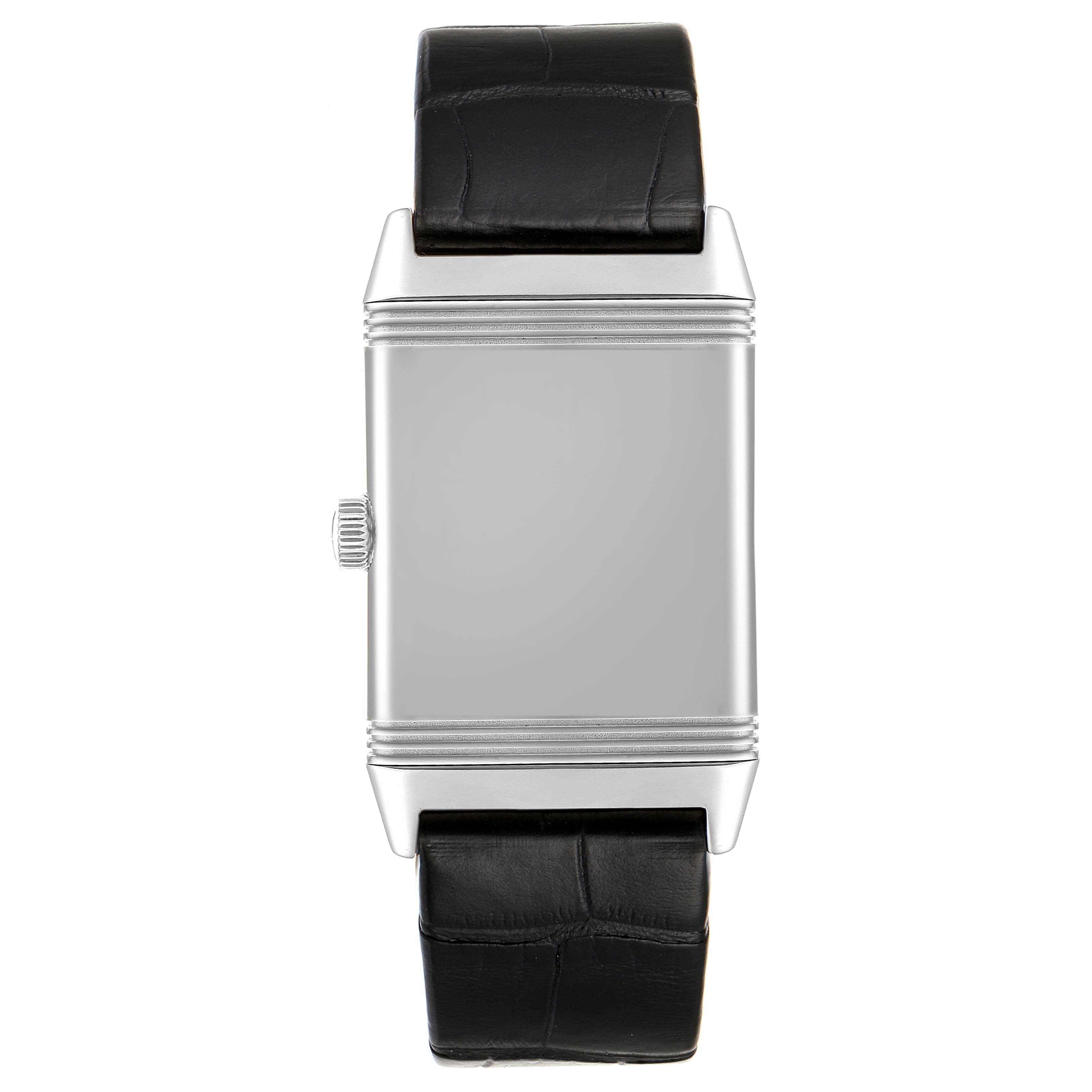 This image shows a front view of a Jaeger-LeCoultre Reverso watch, displaying its rectangular case and black leather strap.