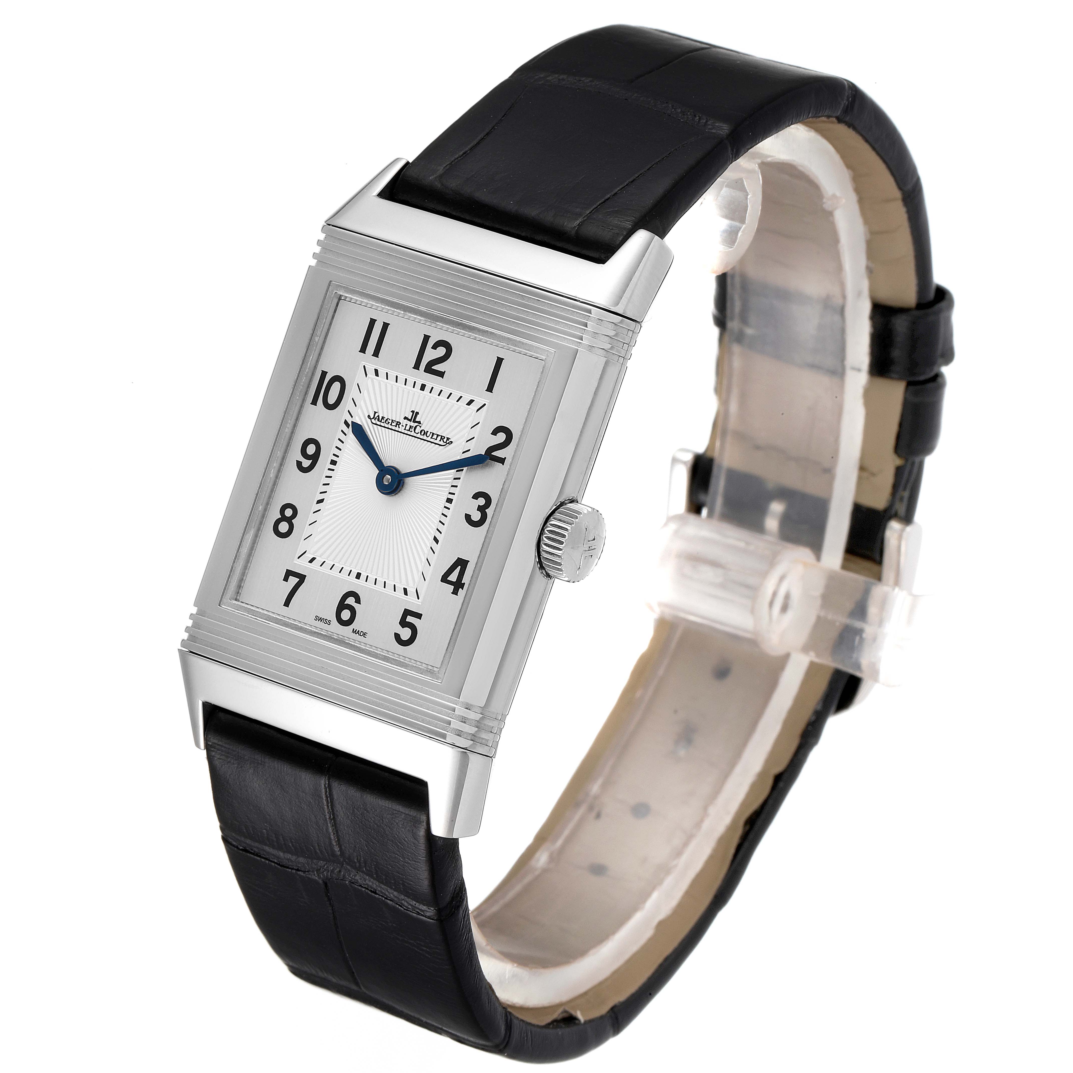 The image shows a Jaeger LeCoultre Reverso Q2548520 Men's Stainless Steel Silver Dial Q2548520 Men's Stainless Steel Silver Dial watch, angled to display the rectangular dial, crown, and leather strap.