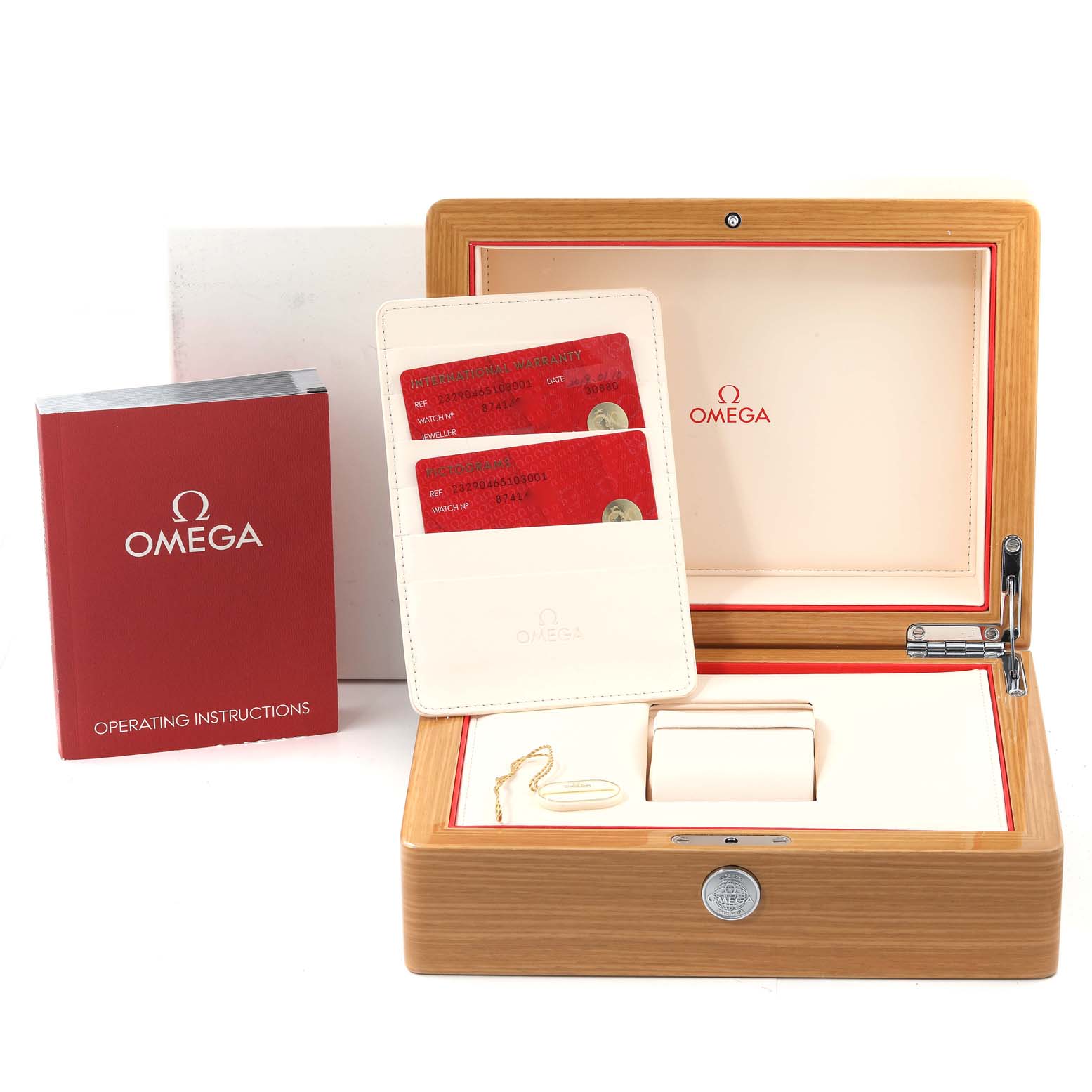 The image shows the Omega Planet Ocean 232.90.46.51.03.001 Men's Titanium Blue Dial 232.90.46.51.03.001 Men's Titanium Blue Dial accessories, including the watch box, operating instructions, and warranty cards.