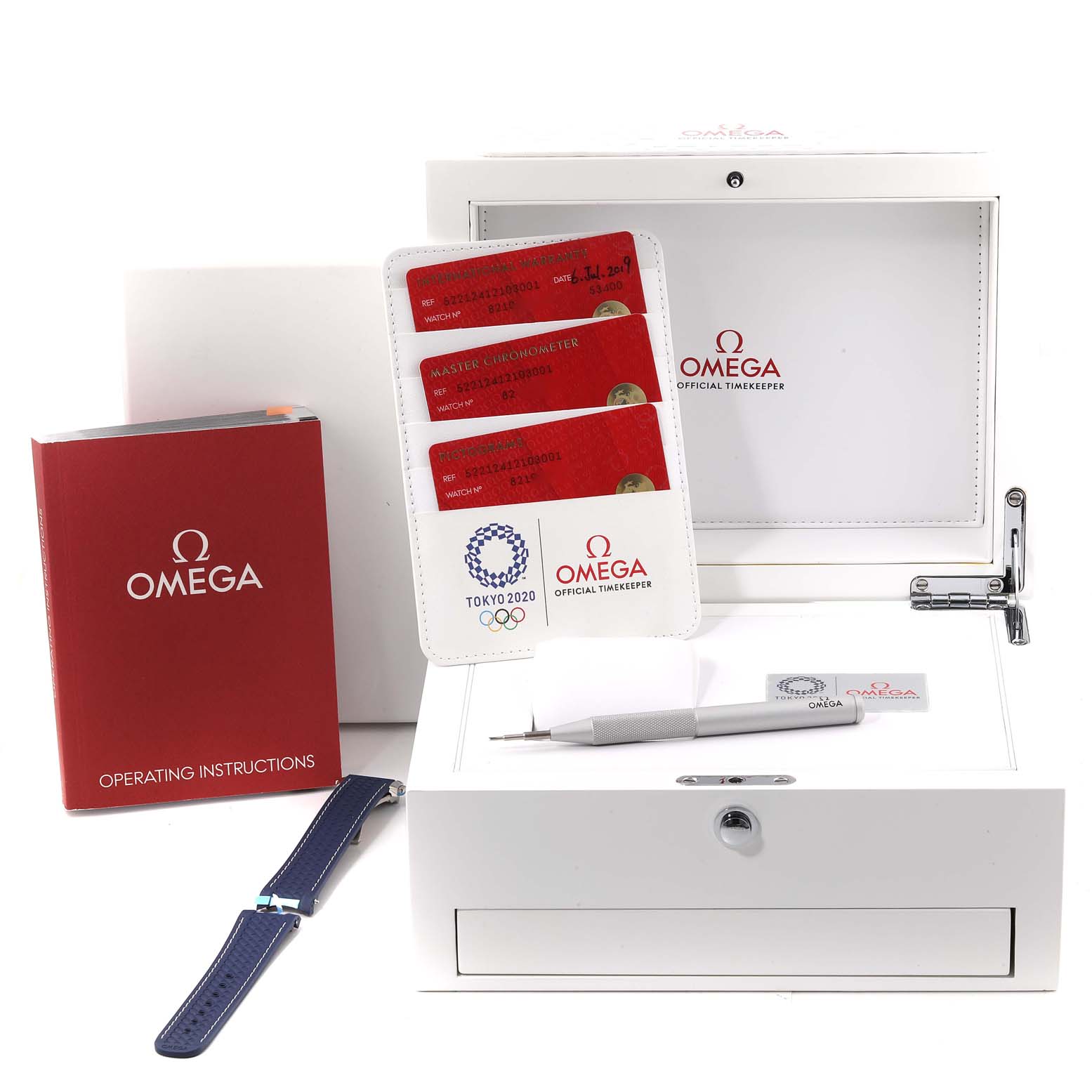 The image shows accessories for the Omega Aqua Terra 522.12.41.21.03.001 Men's Stainless Steel Blue Dial 522.12.41.21.03.001 Men's Stainless Steel Blue Dial watch, including a box, warranty cards, a manual, a tool, and a strap.