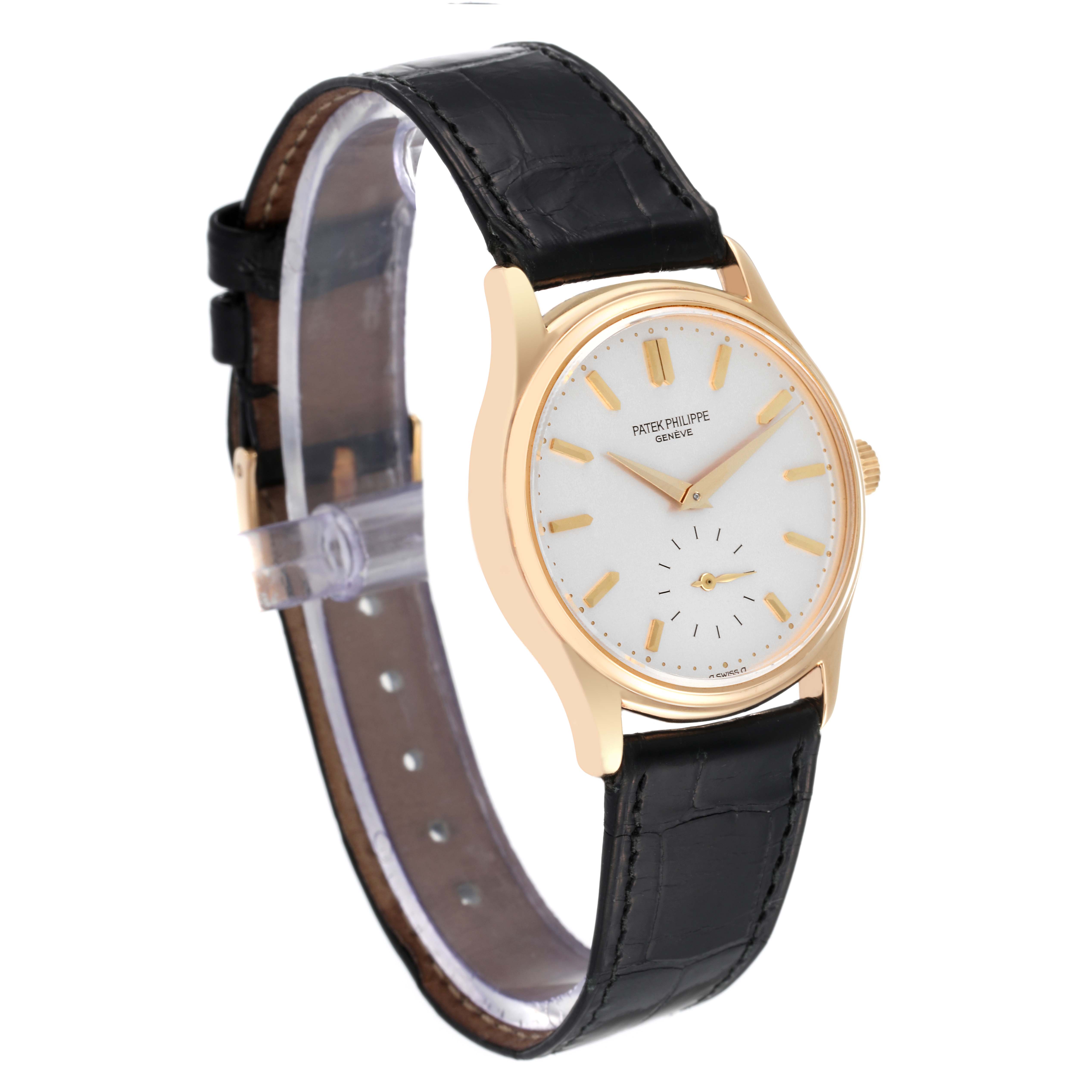 The image shows a Patek Philippe Calatrava 3923J Men's Yellow Gold Silver Dial 3923J Men's Yellow Gold Silver Dial watch at a slight angle, highlighting its dial, case, and leather strap.