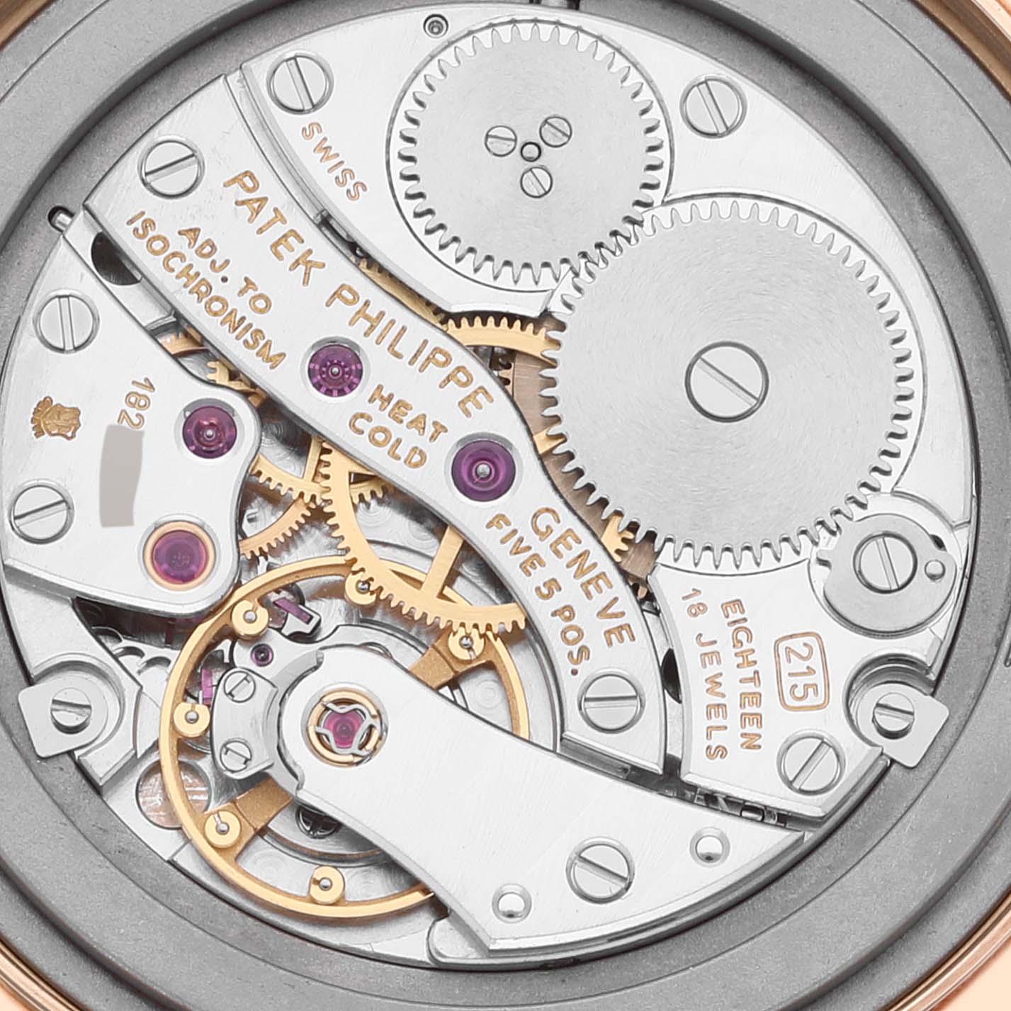 The image shows the detailed inner mechanics of a Patek Philippe Calatrava 3923J Men's Yellow Gold Silver Dial 3923J Men's Yellow Gold Silver Dial watch, viewed from the back.