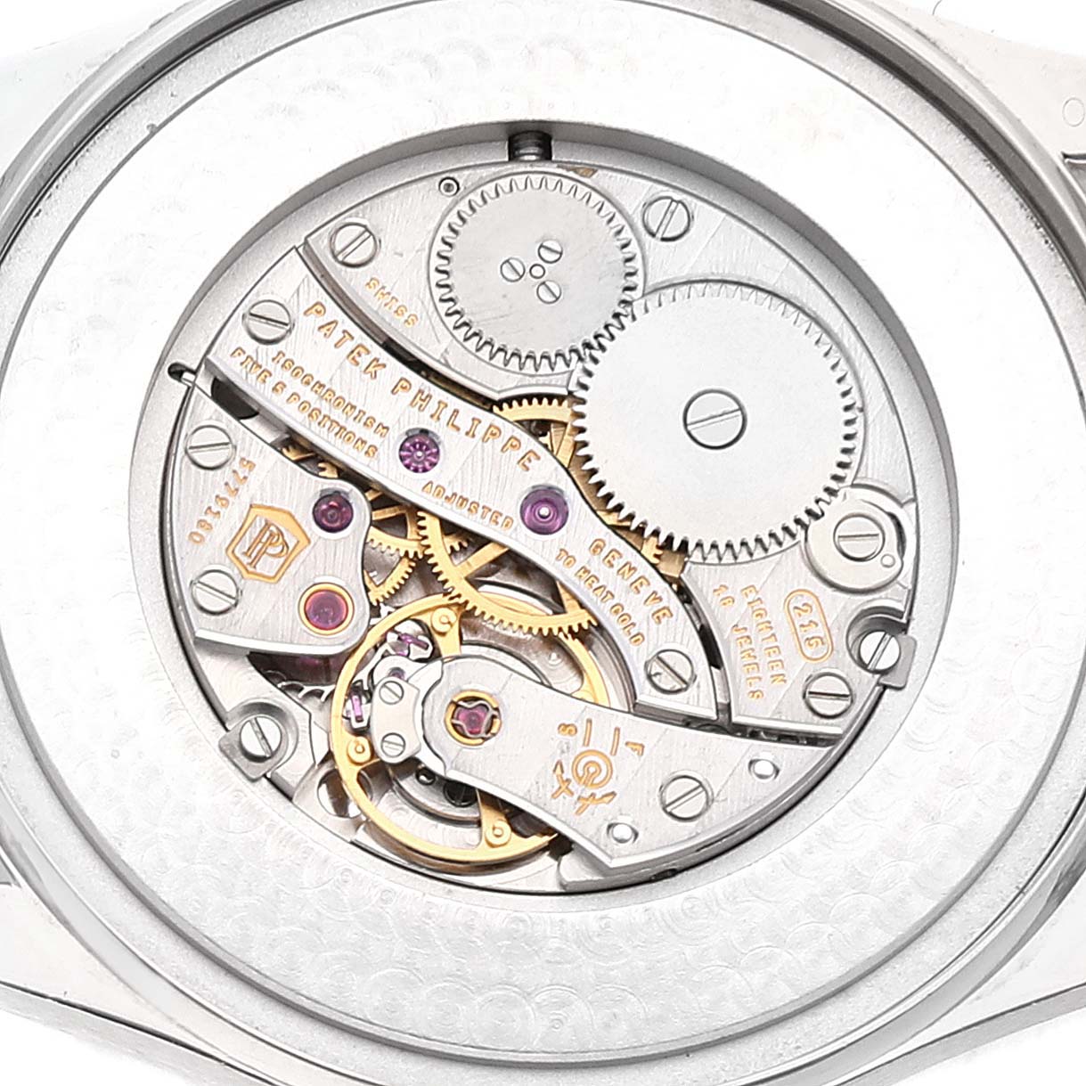 The image shows the intricate movement mechanism of the Patek Philippe Calatrava 5196G Men's White Gold Silver Dial 5196G Men's White Gold Silver Dial watch from a back angle.