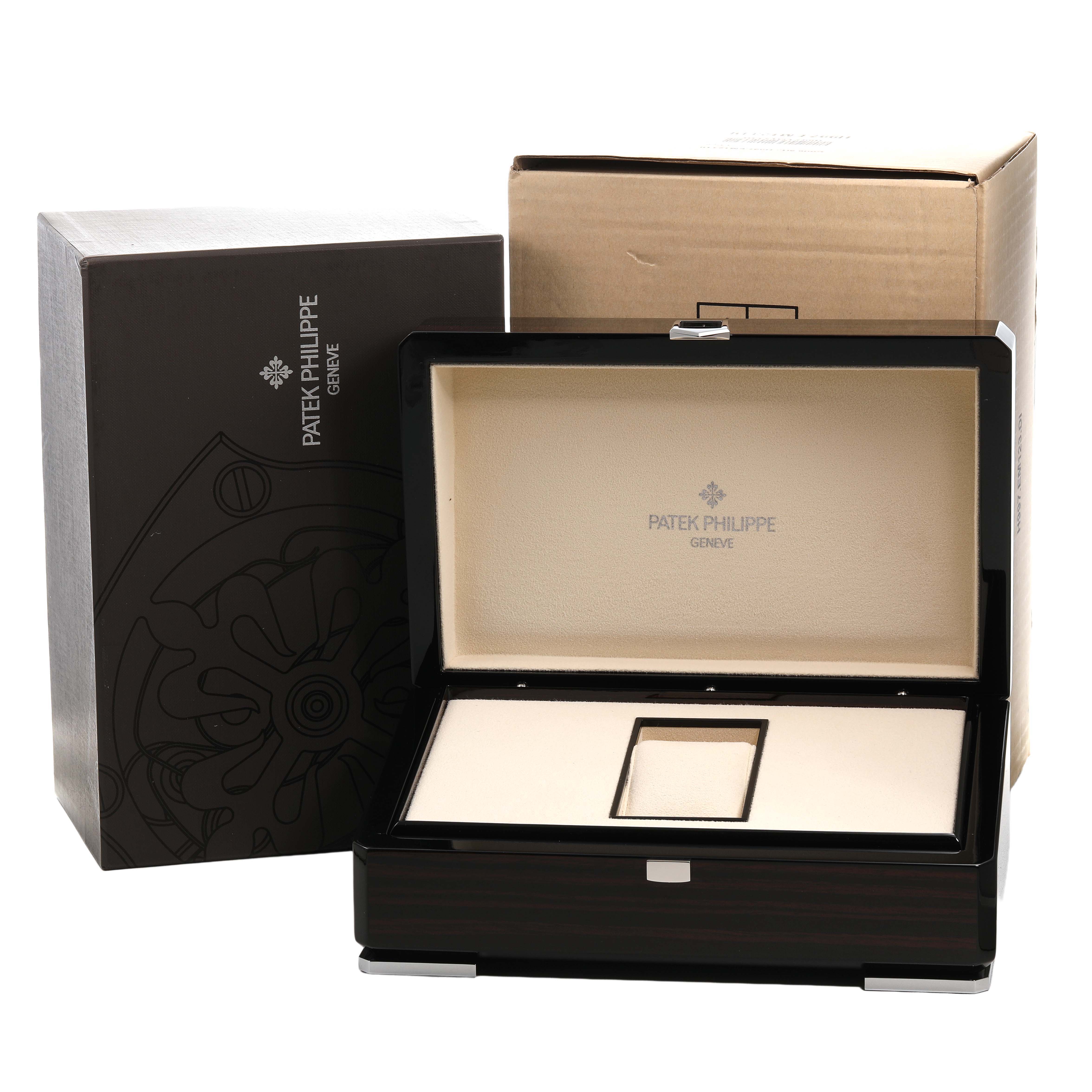 The image shows a Patek Philippe Complications 4946R-001 Men's Rose Gold Brown Dial watch box open, displaying the interior along with outer packaging.