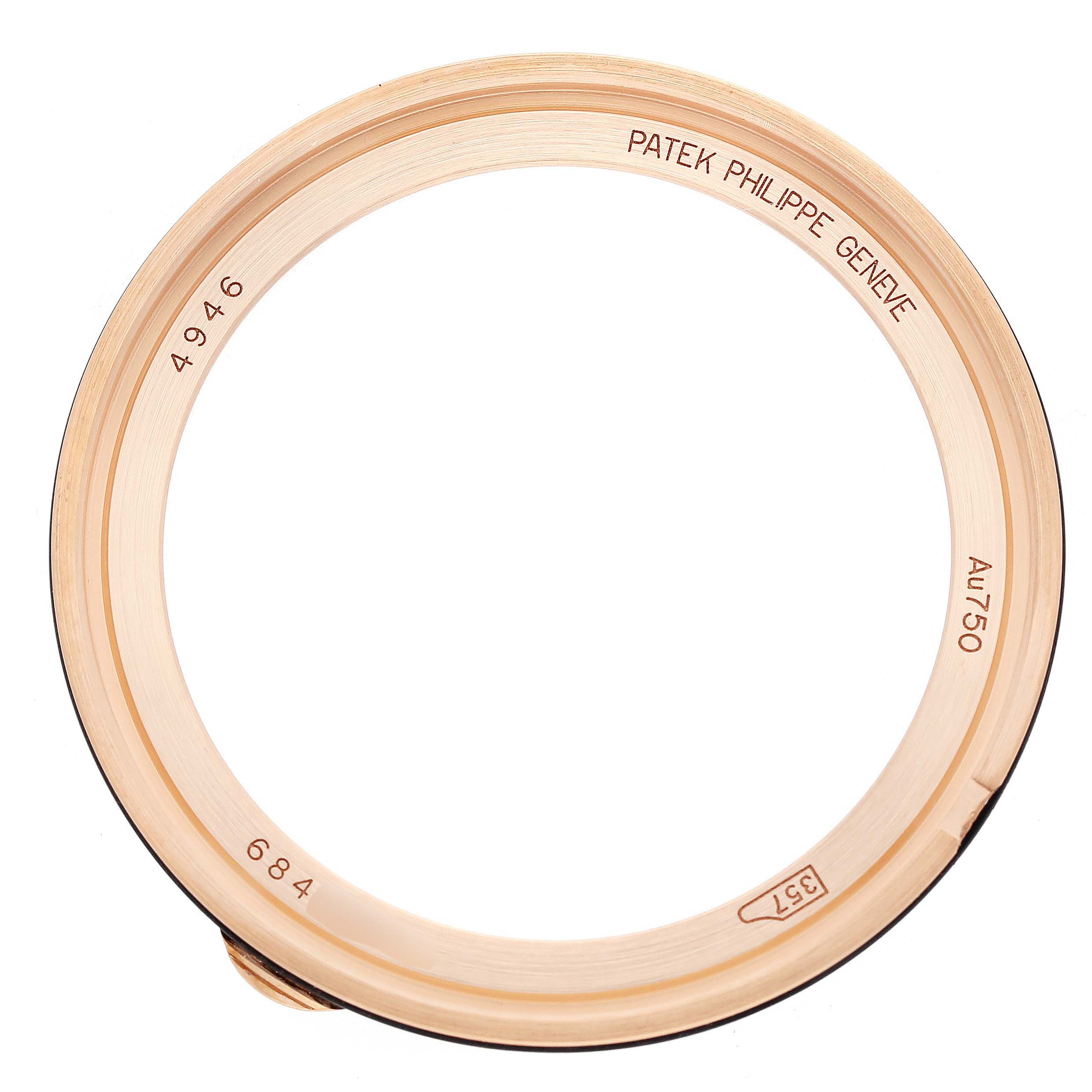 The image shows a close-up of a rose gold bezel for a Patek Philippe Complications 4946R-001 Men's Rose Gold Brown Dial watch, viewed from the side.