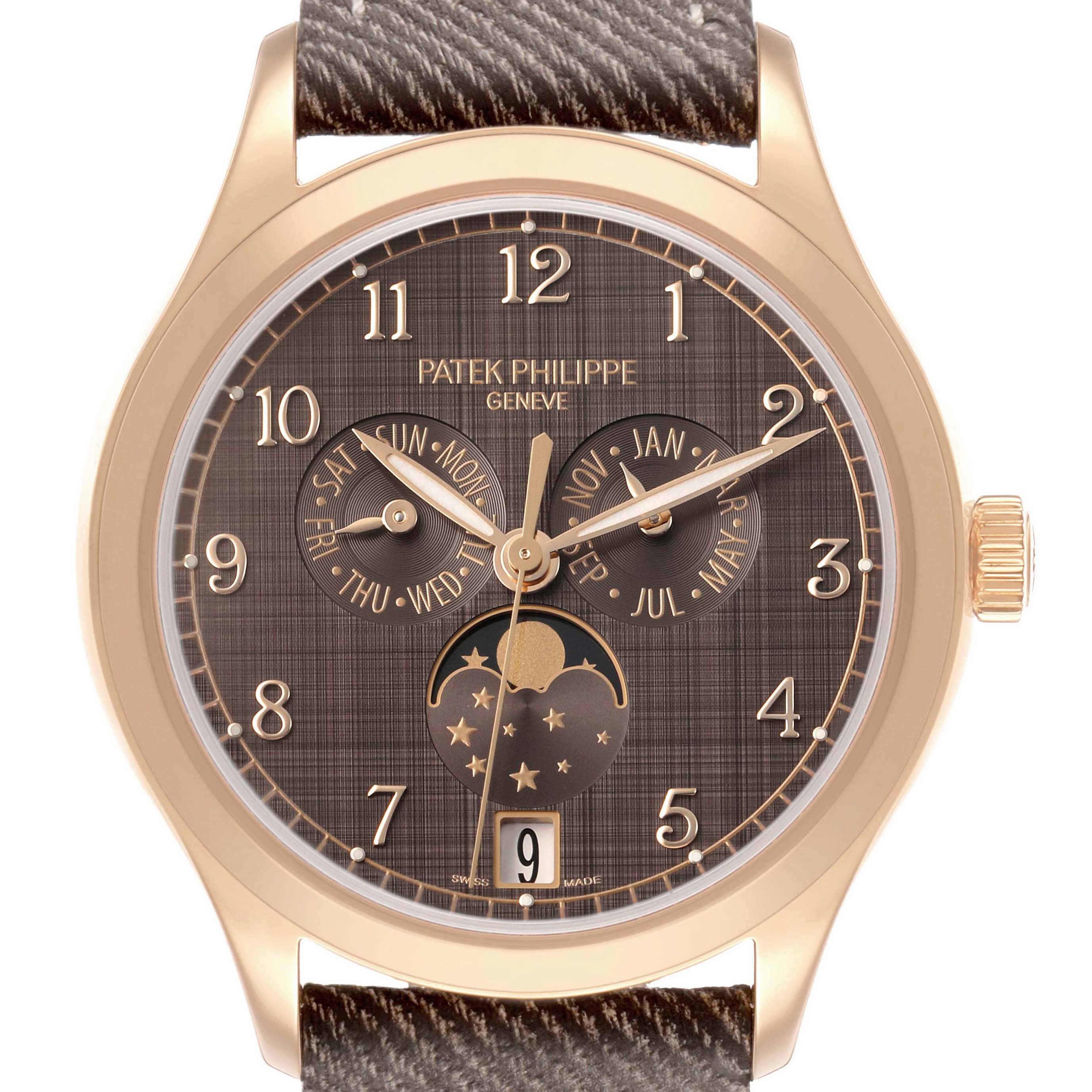 The Patek Philippe Complications 4946R-001 Men's Rose Gold Brown Dial watch is shown from the front, featuring dials for day, date, and moon phases.