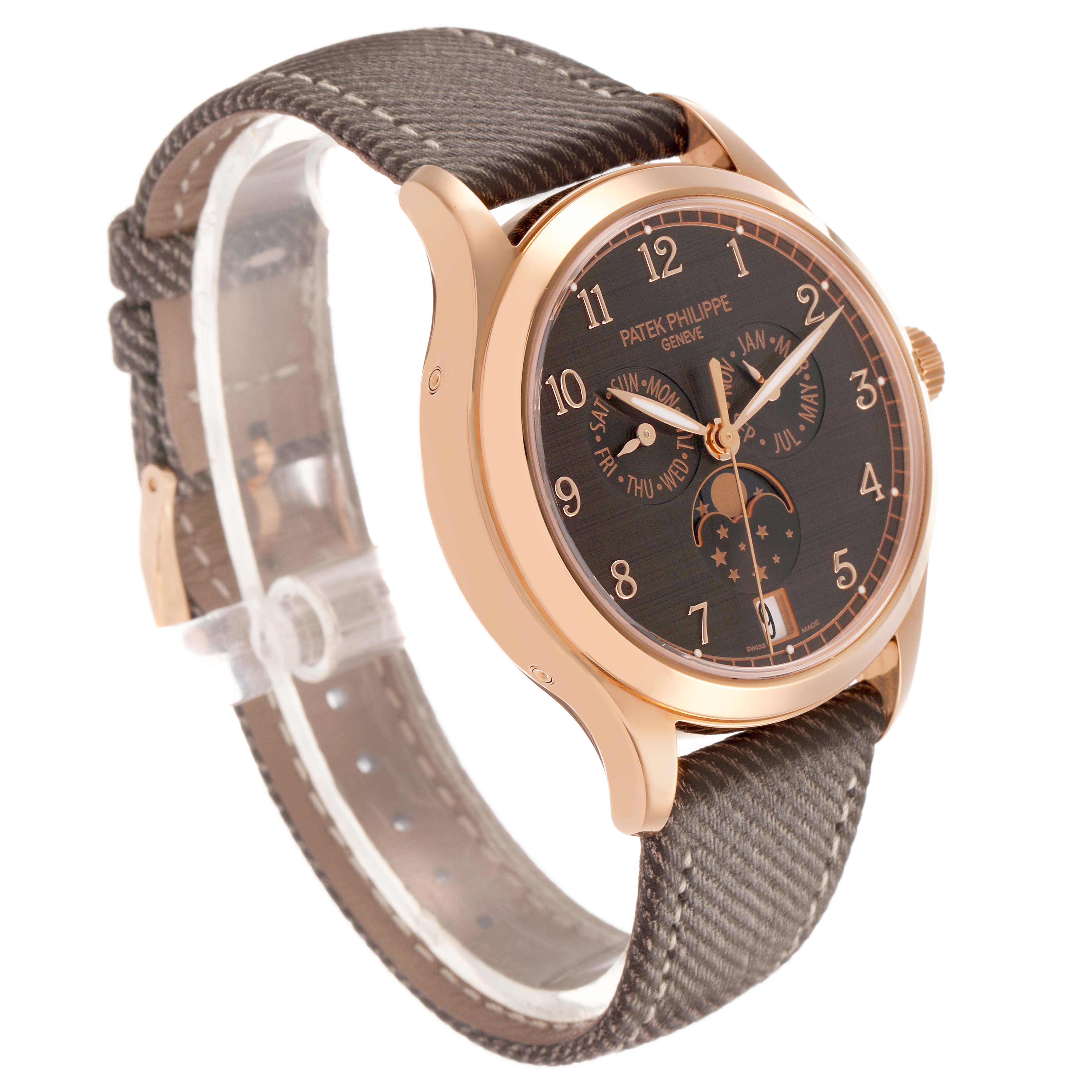 The Patek Philippe Complications 4946R-001 Men's Rose Gold Brown Dial watch is shown at a three-quarter angle, highlighting its dial, case, and strap.