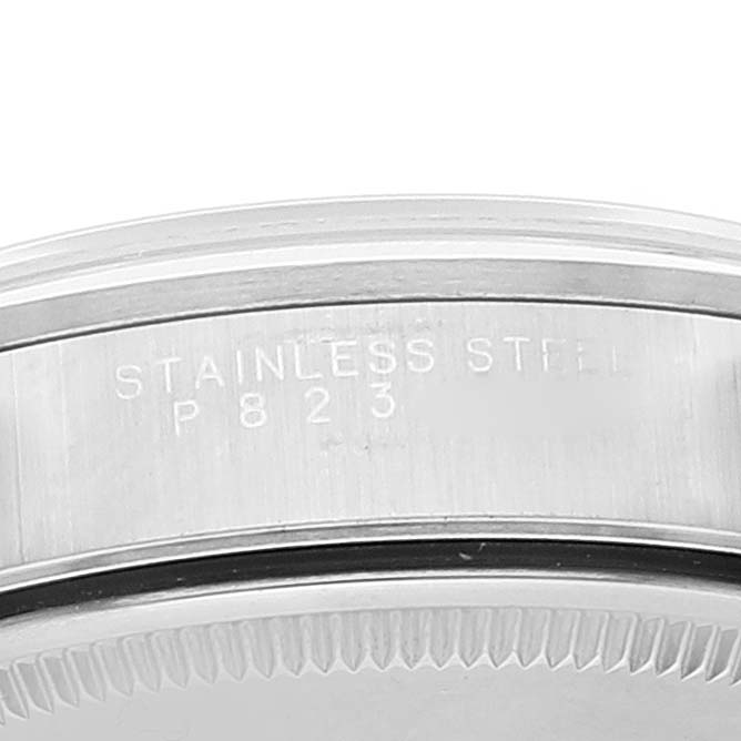 The image shows a close-up of the side of the case with engraving on a Rolex Air-King 14000 Men's Stainless Steel Blue Dial 14000 Men's Stainless Steel Blue Dial watch.