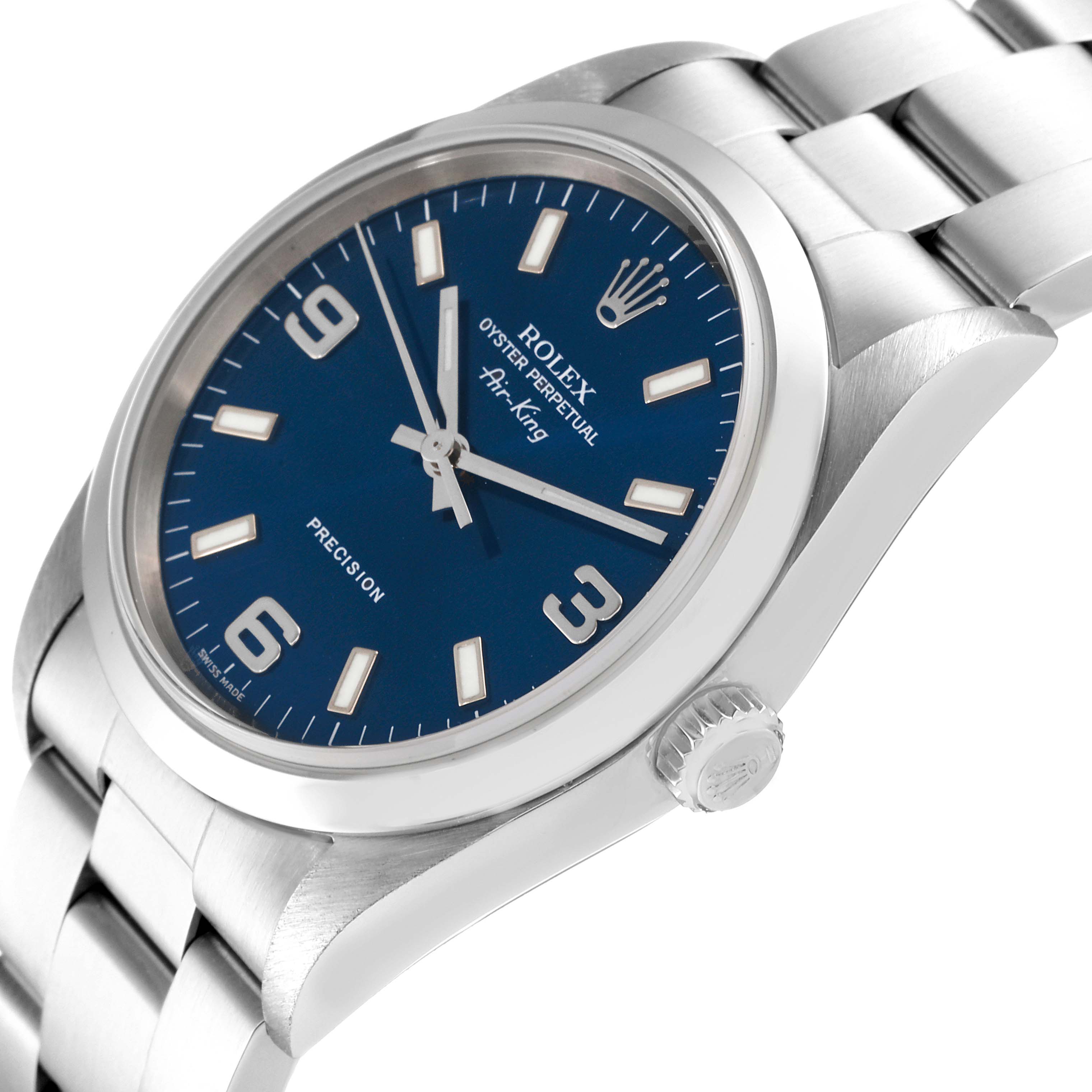 The Rolex Air-King 14000 Men's Stainless Steel Blue Dial 14000 Men's Stainless Steel Blue Dial watch is shown at an angle, highlighting the blue dial, crown, and stainless steel bracelet.