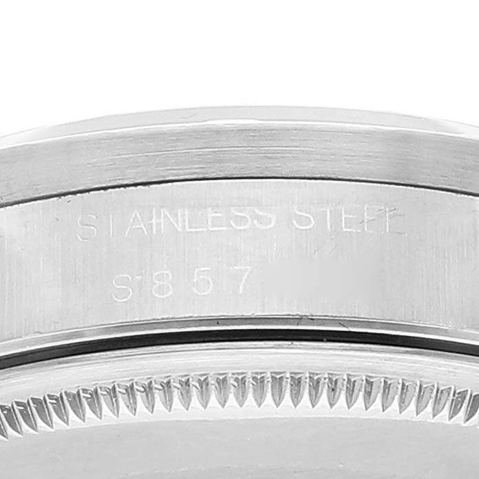 This image shows a close-up of the stainless steel case back edge and the grooved bezel of a Rolex Air-King 14010 Men's Stainless Steel Blue Dial 14010 Men's Stainless Steel Blue Dial watch.