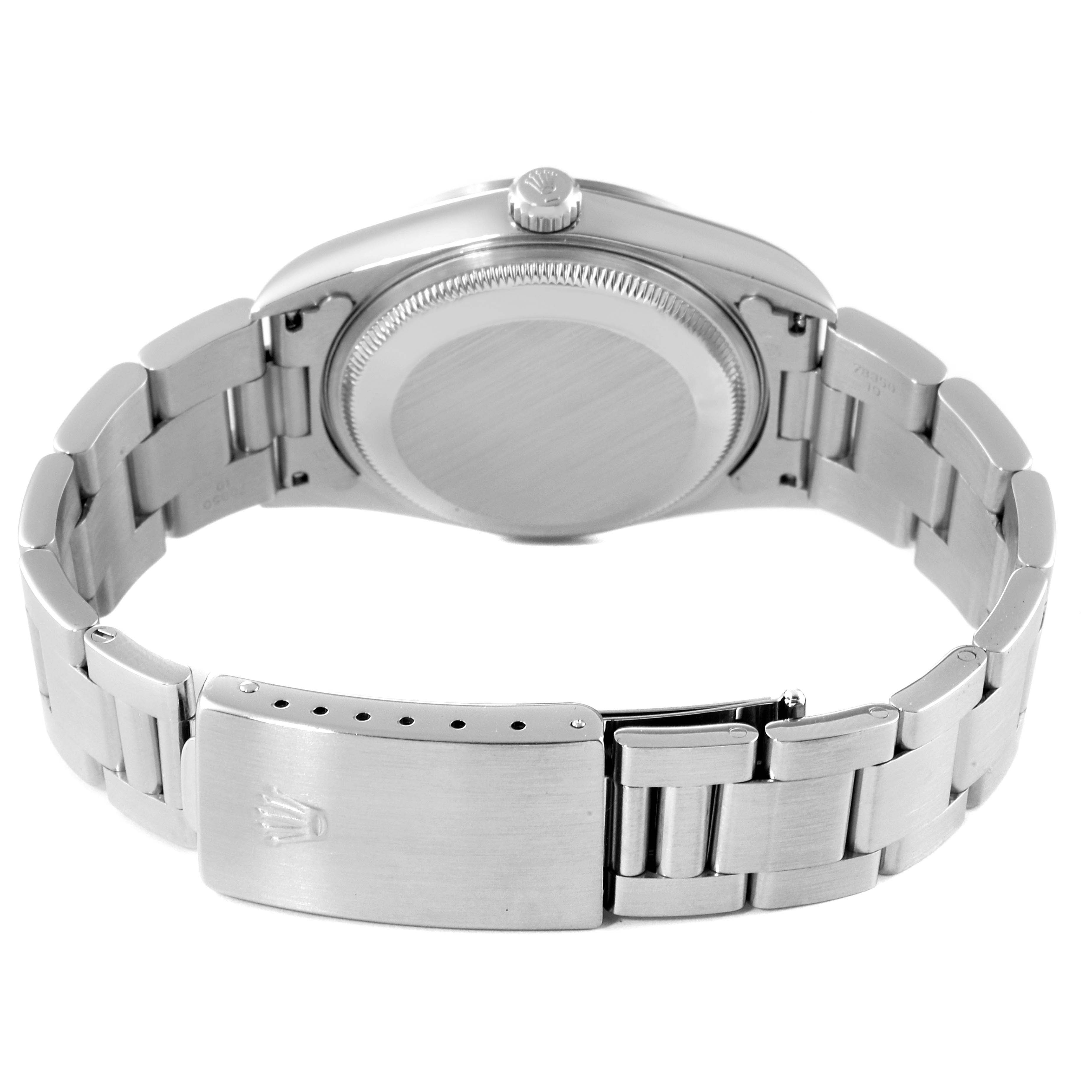 This image shows the back view of the Rolex Date 15200 Men's Stainless Steel Blue Dial 15200 Men's Stainless Steel Blue Dial model watch, highlighting the case back and the stainless steel bracelet with clasp.