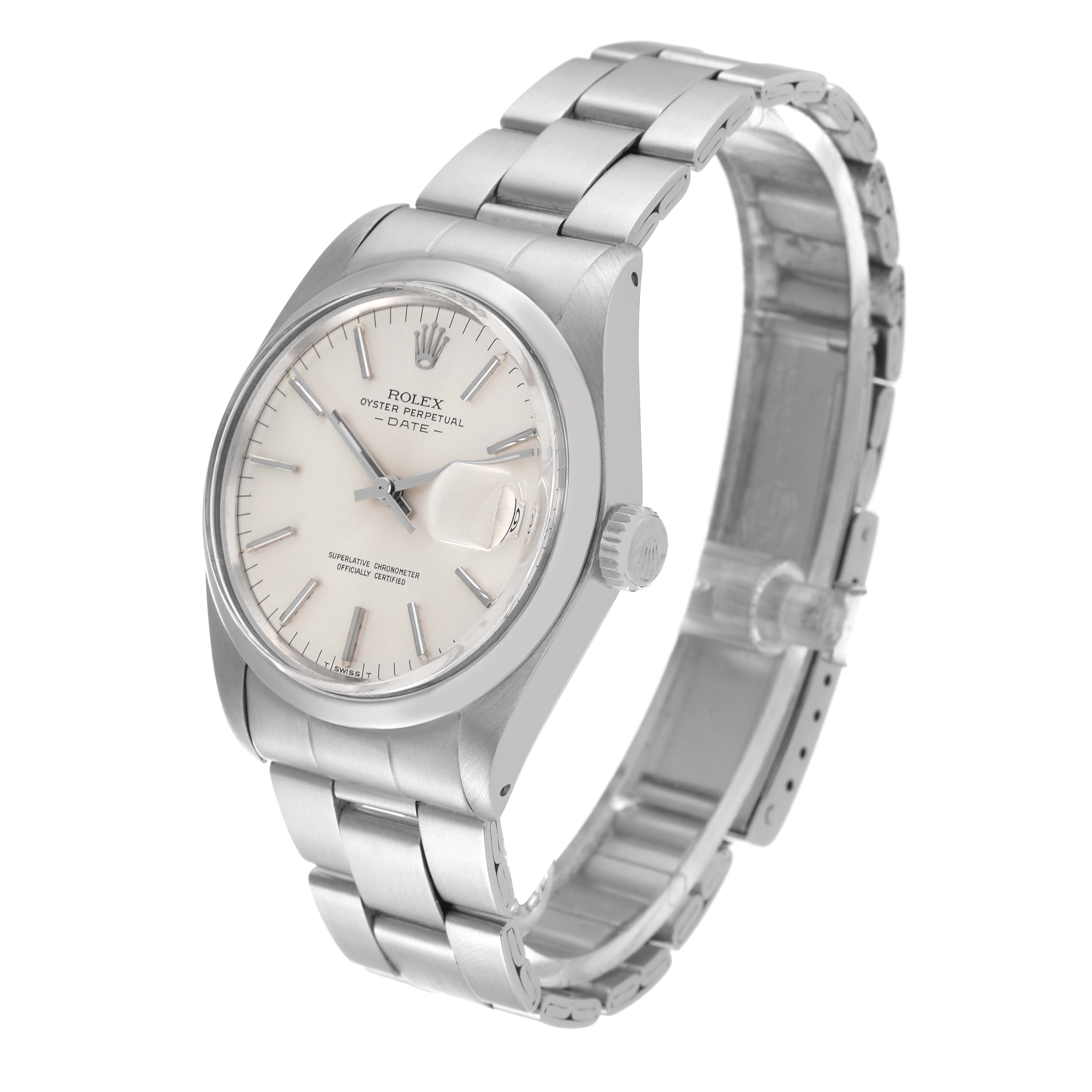 The Rolex Date 1500 Men's Stainless Steel Silver Dial watch is shown at a three-quarter angle, highlighting the dial, bracelet, and crown.