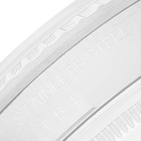 This is a close-up image of the stainless steel bezel with inscriptions on a Rolex Datejust 16220 Men's Stainless Steel Blue Dial 16220 Men's Stainless Steel Blue Dial watch.