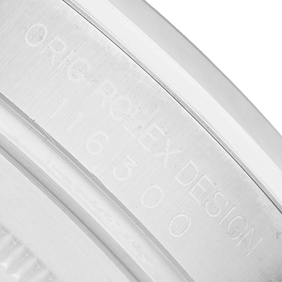The image shows the inner engraving of the Rolex Datejust 41 116300 Men's Stainless Steel Blue Dial, highlighting the model number.