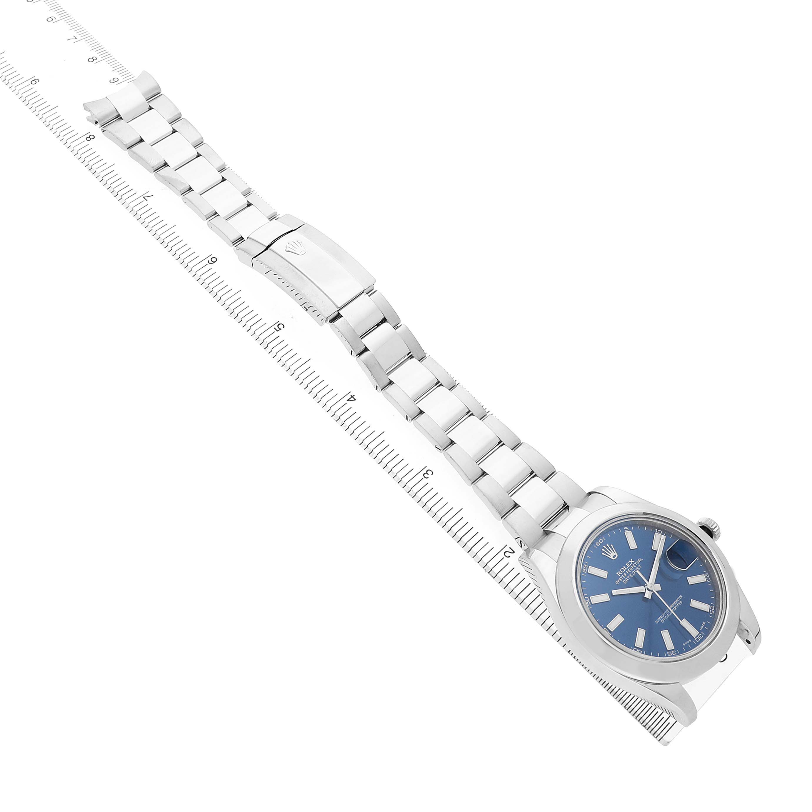 The Rolex Datejust 41 116300 Men's Stainless Steel Blue Dial is shown at an angled side view, displaying its face, clasp, bracelet, and part of the bezel.