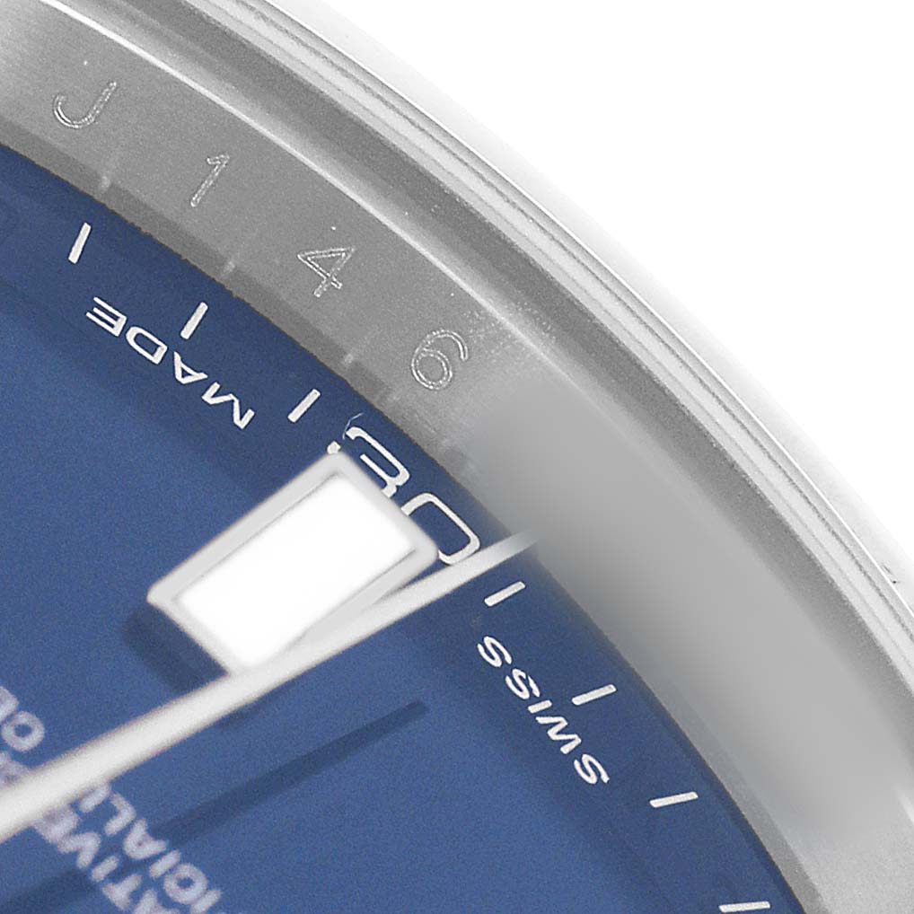 The image shows a close-up of the Rolex Datejust 41 116300 Men's Stainless Steel Blue Dial dial edge, highlighting the minute markers and part of the hour marker.