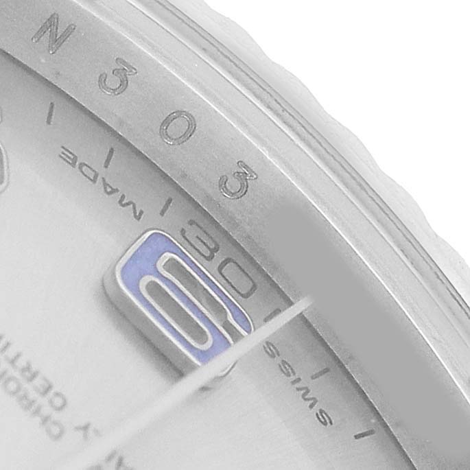 The image shows a close-up of the dial edge and hands of a Rolex Datejust 41 116334 Men's Stainless Steel Silver Dial, focusing on the minute markers and numerals.