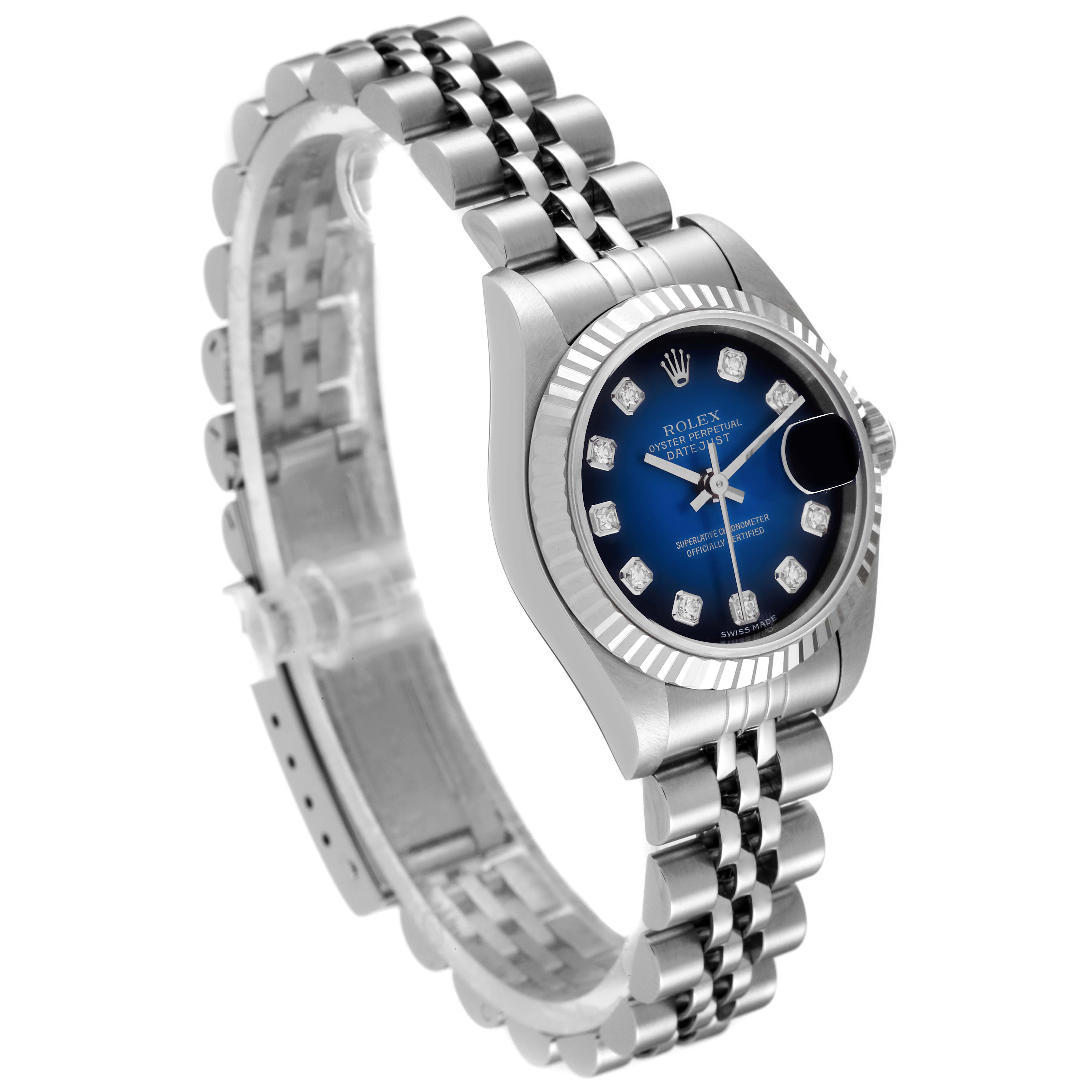This image shows a Rolex Datejust 79174 Women's Stainless Steel Blue Dial 79174 Women's Stainless Steel Blue Dial watch at a slight angle, displaying its blue dial, fluted bezel, and jubilee bracelet.