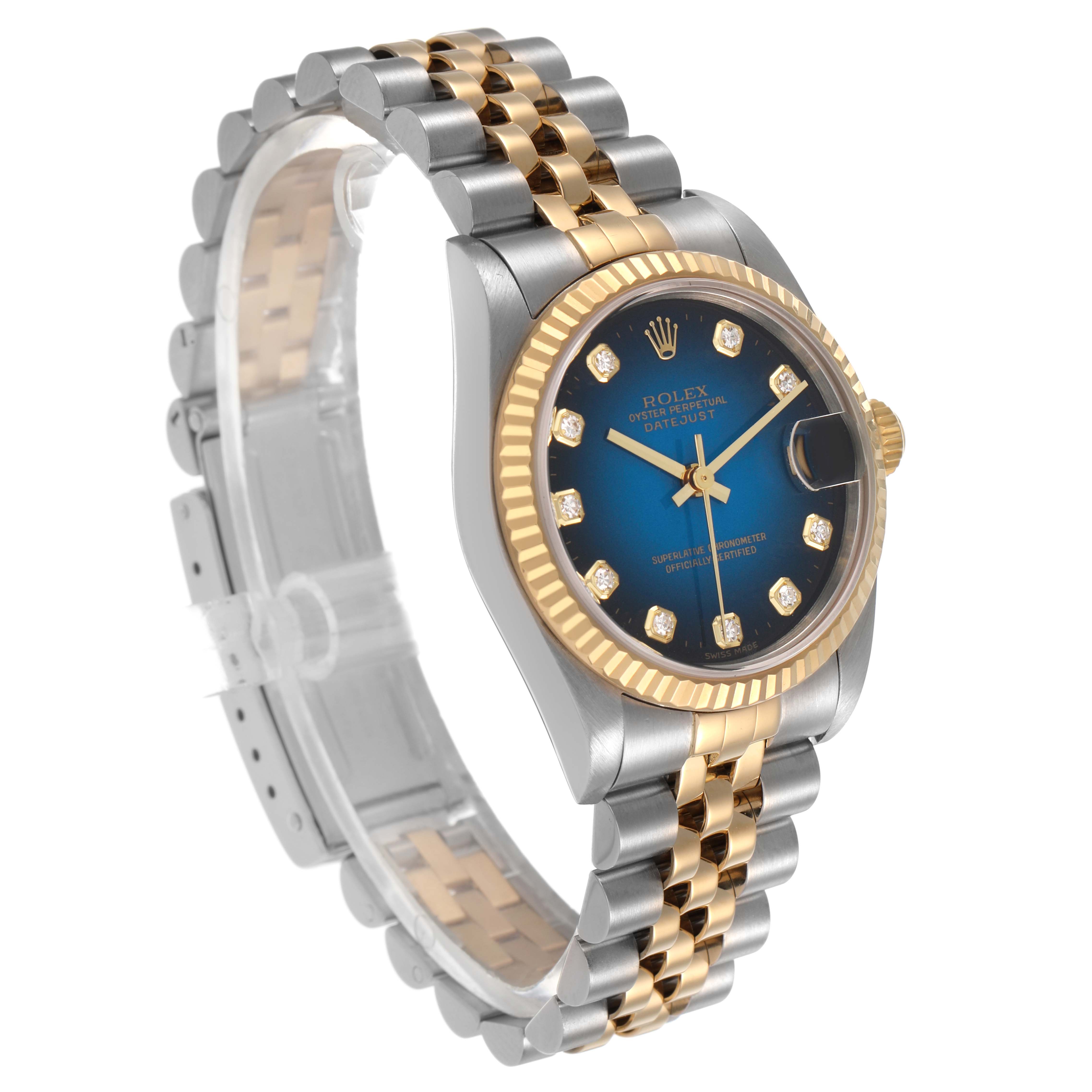 The Rolex Mid-Size 78273 Women's Steel and Gold (two tone) Blue Dial watch is shown from an angled side view, highlighting the dial, bezel, and two-tone bracelet.