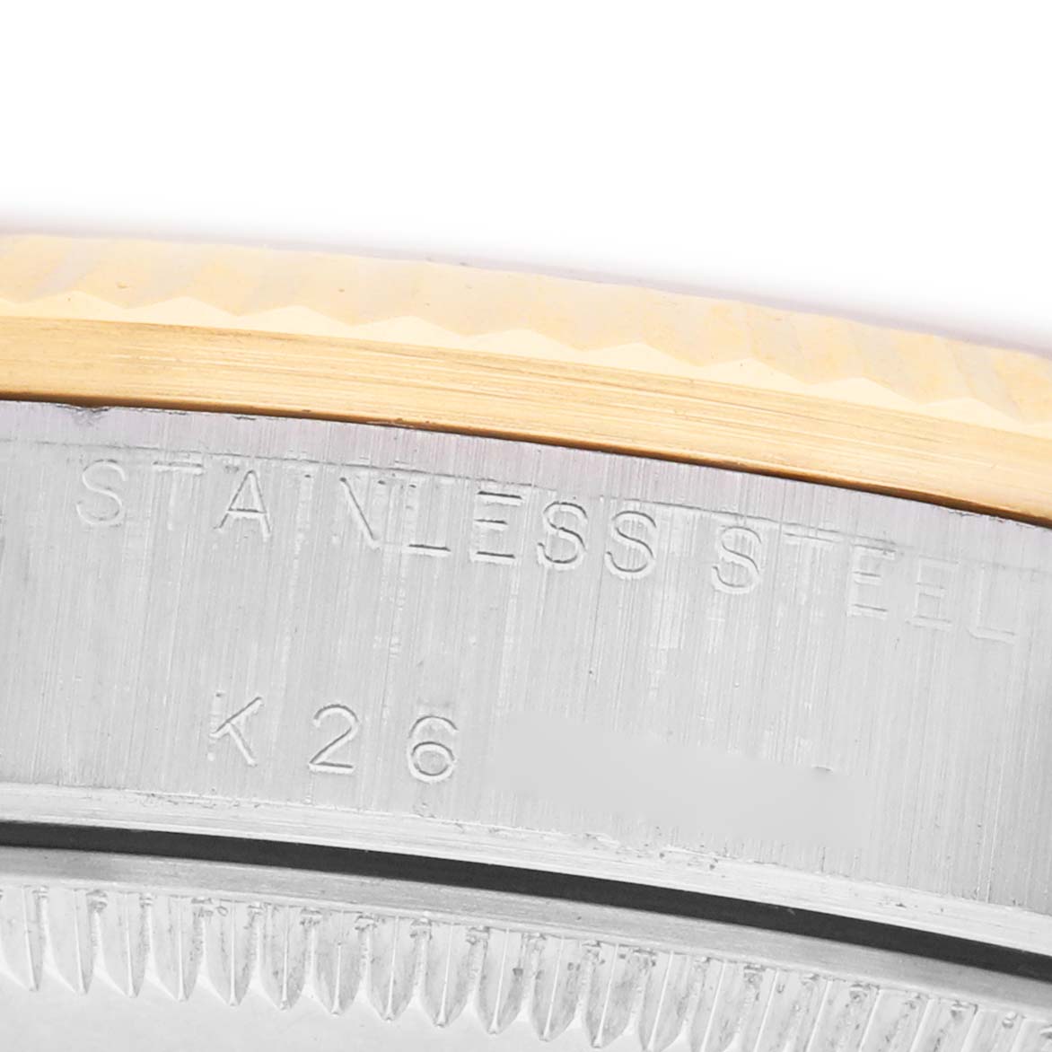 The image shows a close-up of the side of a Rolex Mid-Size 78273 Women's Steel and Gold (two tone) Blue Dial model, highlighting the stainless steel section.