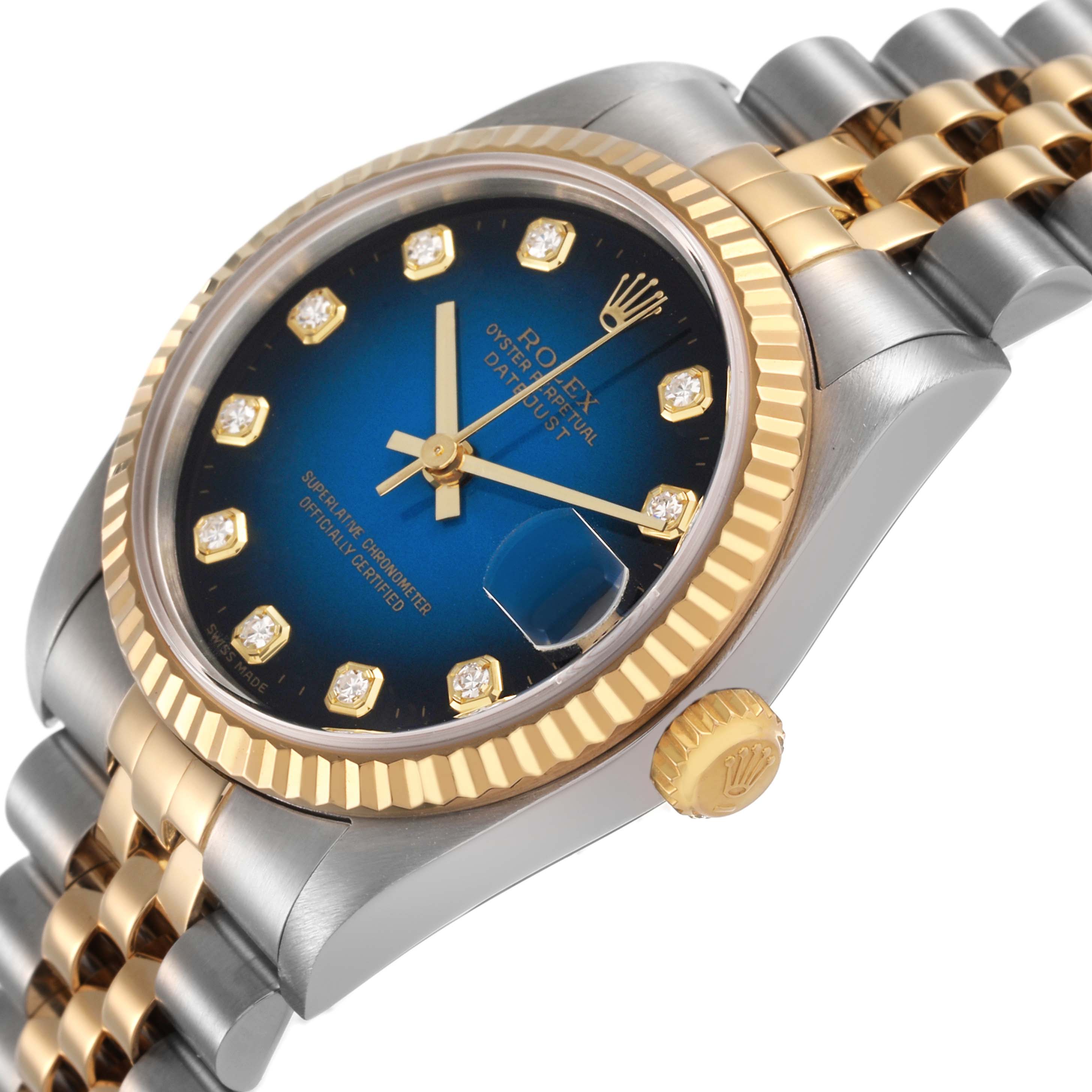 The Rolex Mid-Size 78273 Women's Steel and Gold (two tone) Blue Dial watch is shown at an angled view, highlighting the blue dial, fluted bezel, crown, and two-tone Jubilee bracelet.
