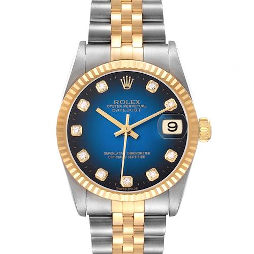 The Rolex Mid-Size 78273 Women's Steel and Gold (two tone) Blue Dial Datejust is shown from the front, displaying its dial, hands, hour markers, and part of the bracelet.