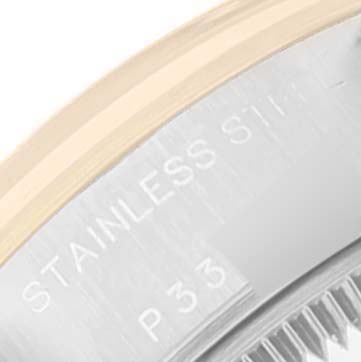 The image shows a close-up of the side casing of a Rolex Datejust 79163 Women's Steel and Gold (two tone) Silver Dial 79163 Women's Steel and Gold (two tone) Silver Dial watch, highlighting the "Stainless Steel" engraving.