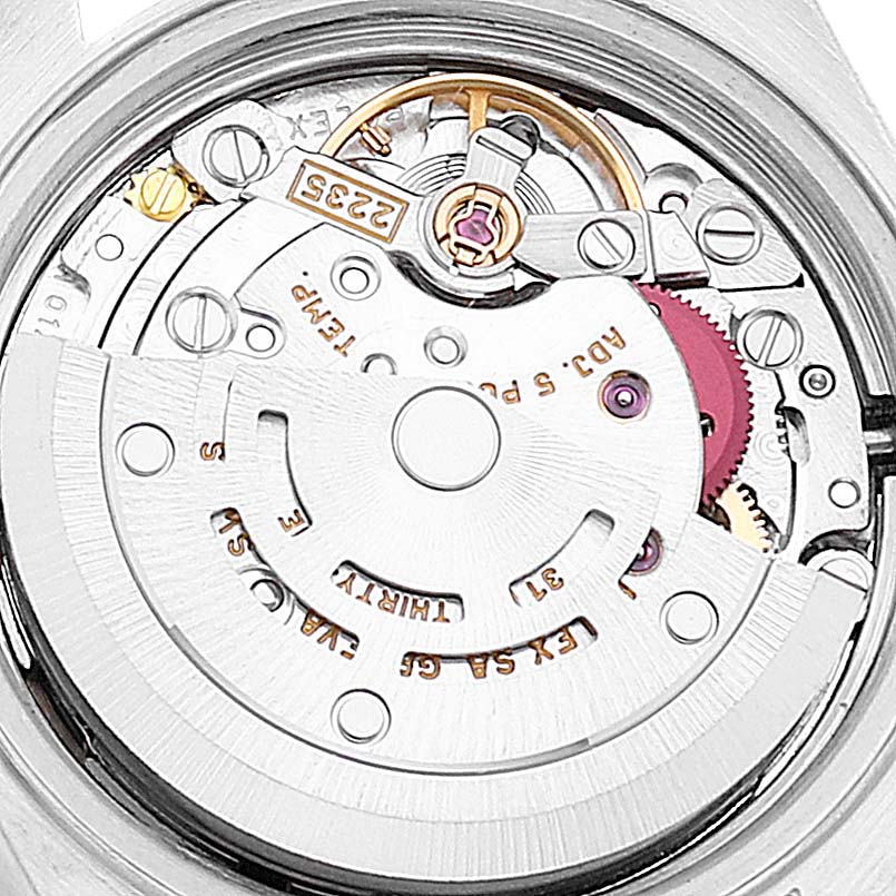 This image shows the back view of the Rolex Datejust 79163 Women's Steel and Gold (two tone) Silver Dial 79163 Women's Steel and Gold (two tone) Silver Dial watch, specifically its mechanical movement components.