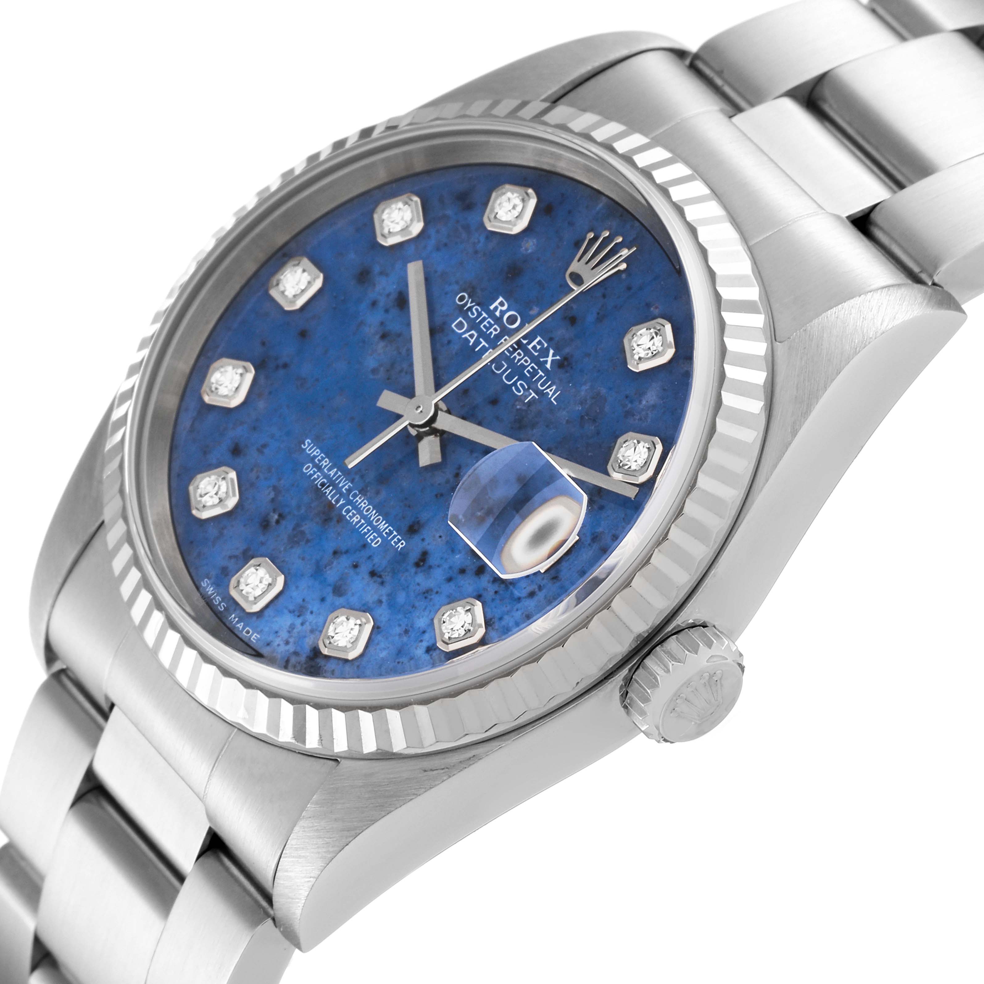 The image shows a partial side and front view of a Rolex Datejust 16234 Men's Stainless Steel Blue Dial 16234 Men's Stainless Steel Blue Dial watch, highlighting its blue dial and diamond hour markers.