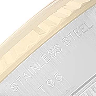 This close-up image shows a section of the stainless steel casing and part of the engraved text on a Rolex Datejust 69173 Women's Steel and Gold (two tone) Silver Dial 69173 Women's Steel and Gold (two tone) Silver Dial watch.