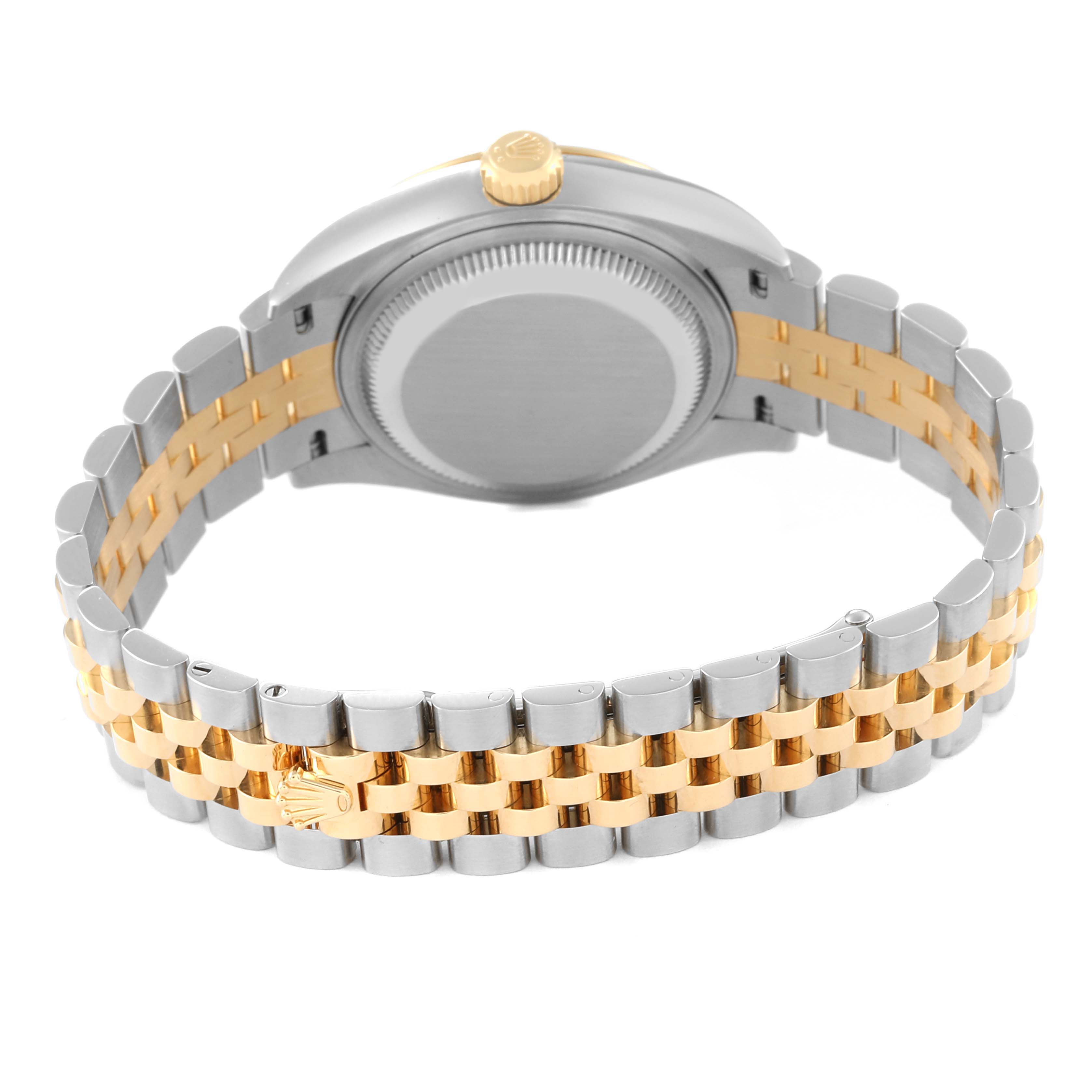 This Rolex Datejust 279163 Women's Steel and Gold (two tone) Champagne Dial 279163 Women's Steel and Gold (two tone) Champagne Dial watch is shown from the back, highlighting its case, crown, and two-tone jubilee bracelet.