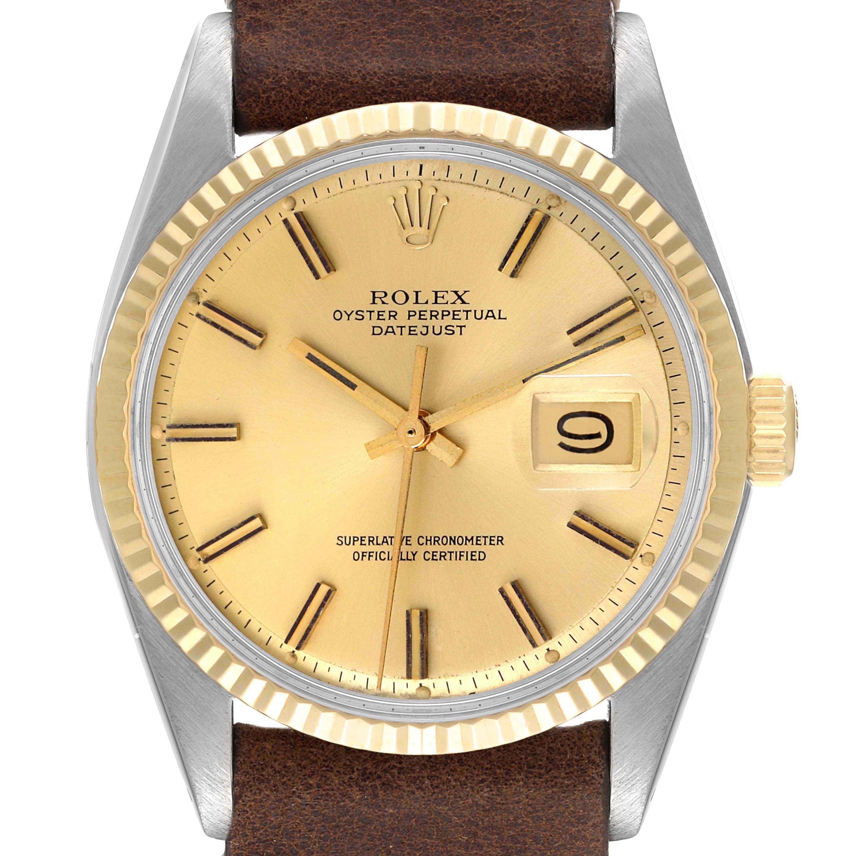 This image shows a close-up view of a Rolex Datejust 1601 Men
s Steel and Gold (two tone) Champagne Dial 1601 Men
s Steel and Gold (two tone) Champagne Dial watch, highlighting the dial, bezel, crown, and leather strap.