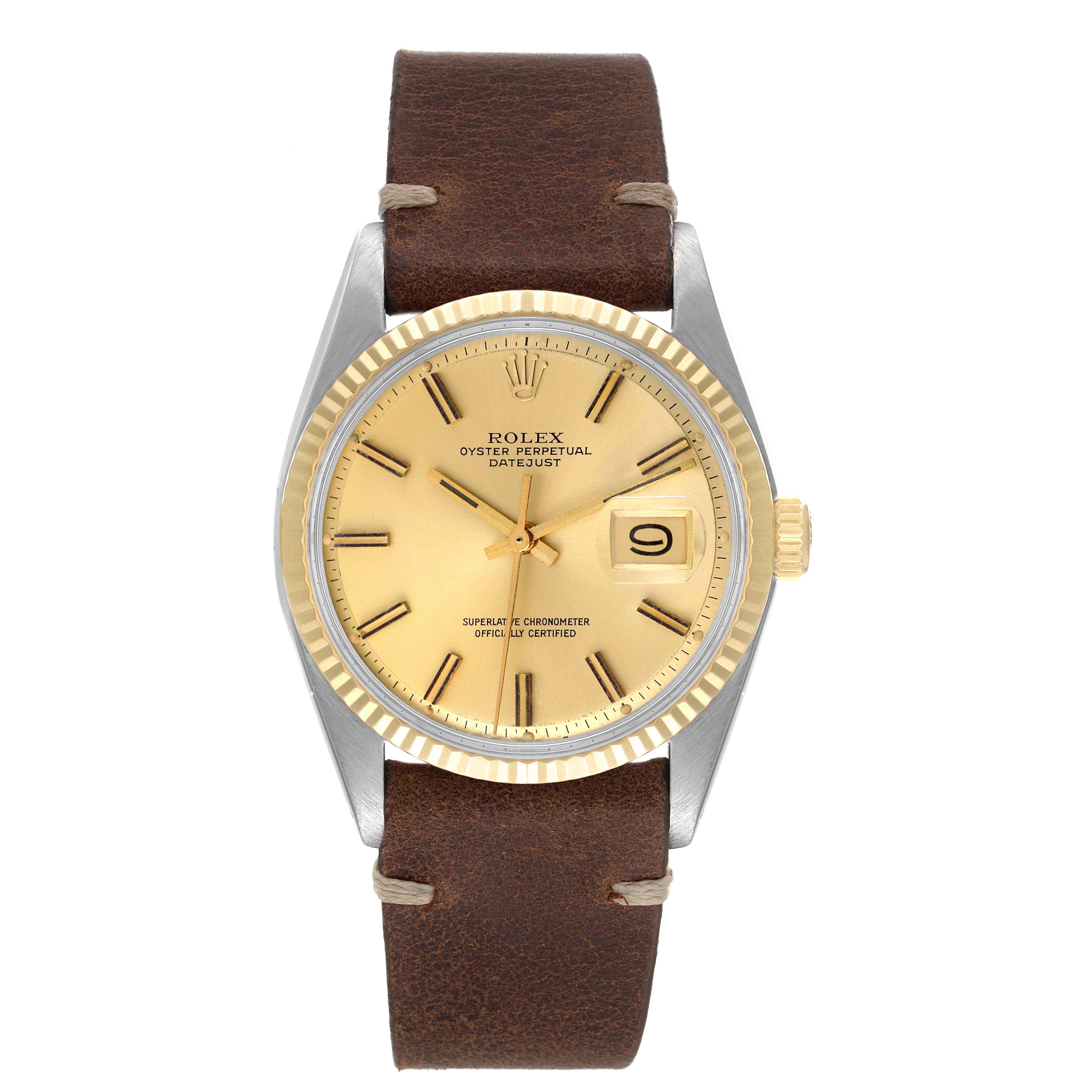The image shows a front view of a Rolex Datejust 1601 Men
s Steel and Gold (two tone) Champagne Dial 1601 Men
s Steel and Gold (two tone) Champagne Dial watch, highlighting its brown leather strap, gold dial, and date window.