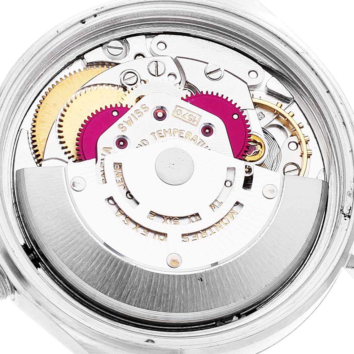 This image shows the internal mechanism and movement of a Rolex Datejust 1601 Men
s Steel and Gold (two tone) Champagne Dial 1601 Men
s Steel and Gold (two tone) Champagne Dial watch from a back angle.