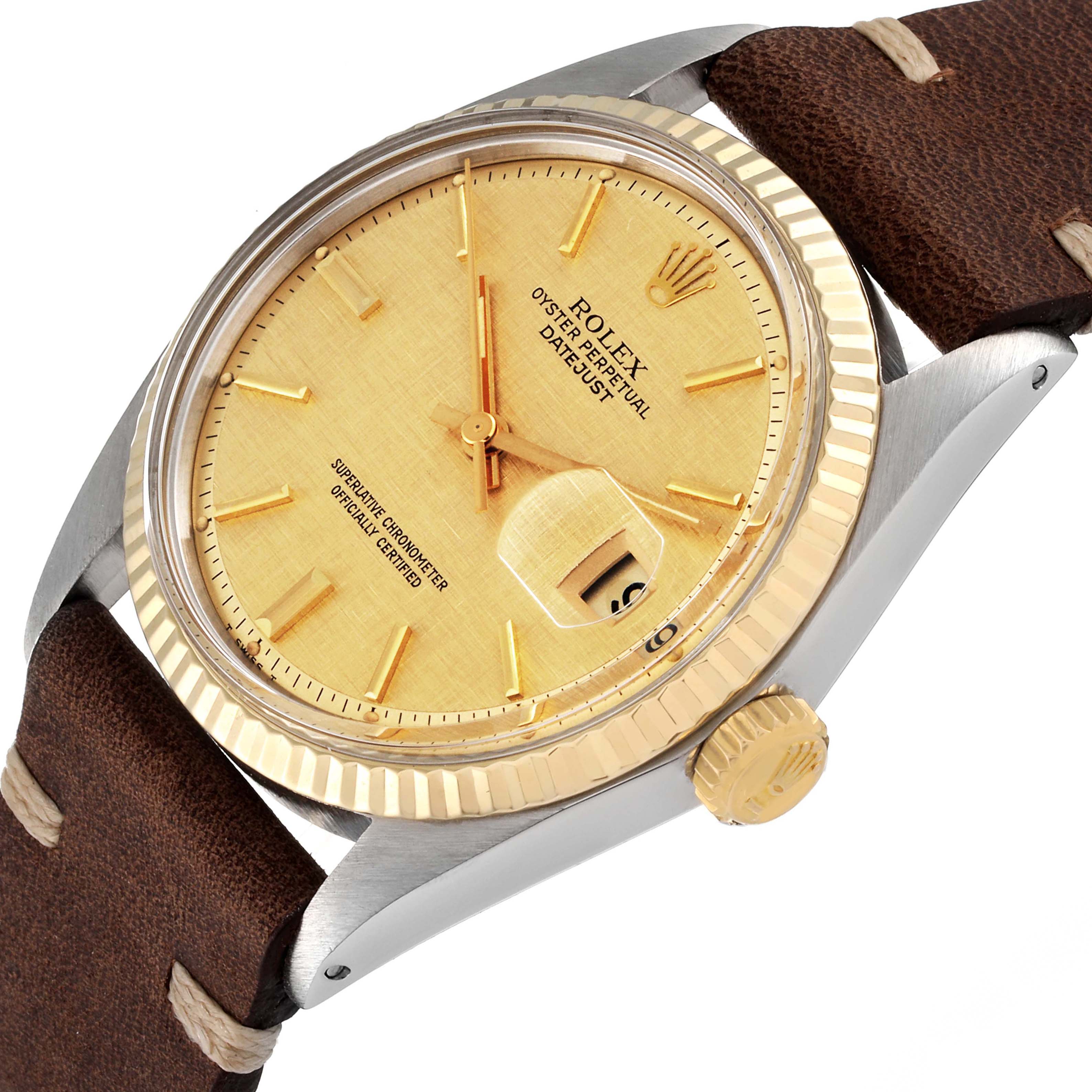 The Rolex Datejust 1601 Men
s Steel and Gold (two tone) Champagne Dial 1601 Men
s Steel and Gold (two tone) Champagne Dial is shown from an angled close-up, highlighting the gold dial, crown, and brown leather strap.