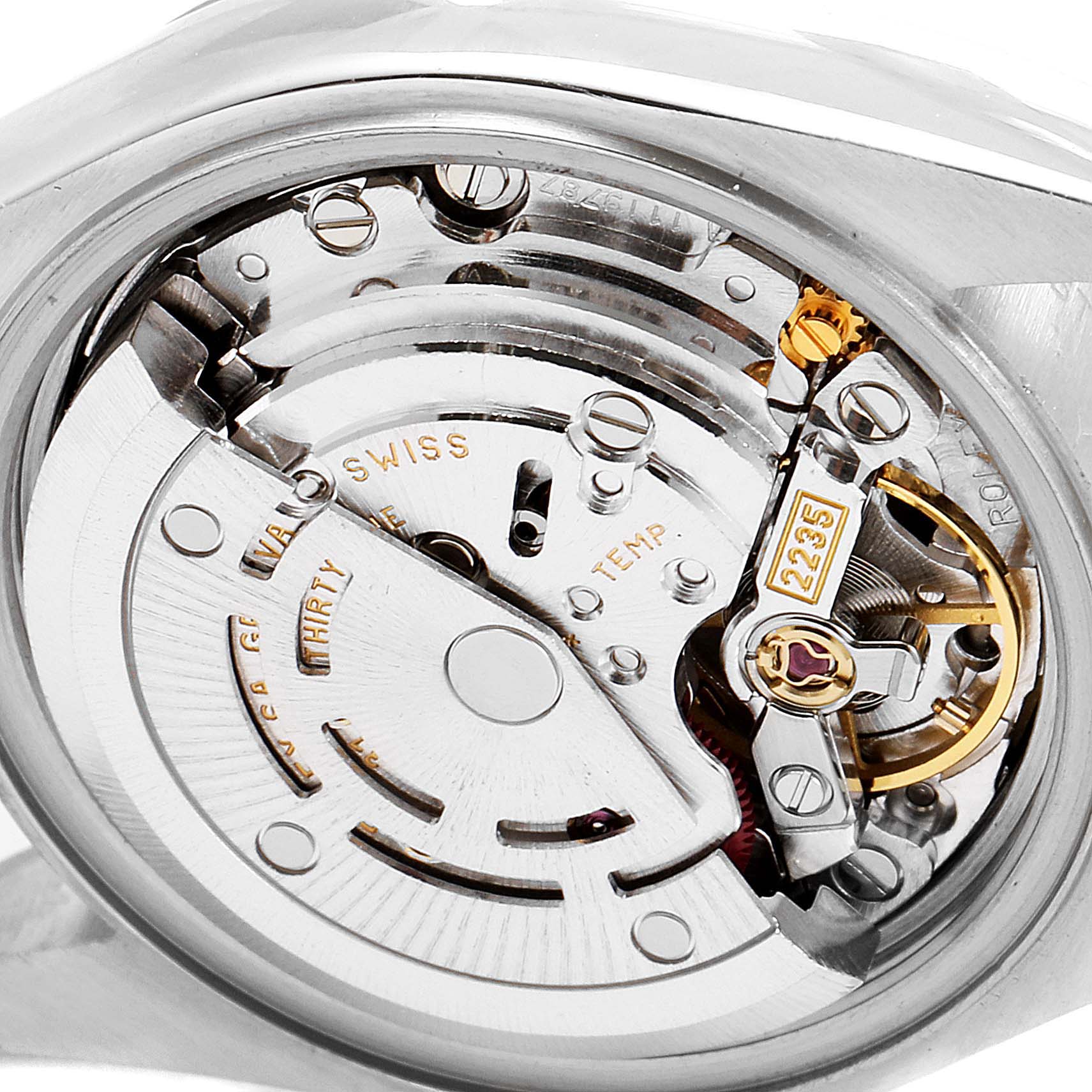 The image shows the internal movement mechanism of a Rolex Datejust 79173 Women
s Steel and Gold (two tone) Champagne Dial 79173 Women
s Steel and Gold (two tone) Champagne Dial watch taken from a close-up angle.