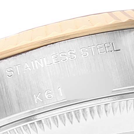 This image shows a partial view of the stainless steel case back of a Rolex Datejust 79173 Women
s Steel and Gold (two tone) White Dial 79173 Women
s Steel and Gold (two tone) White Dial watch.