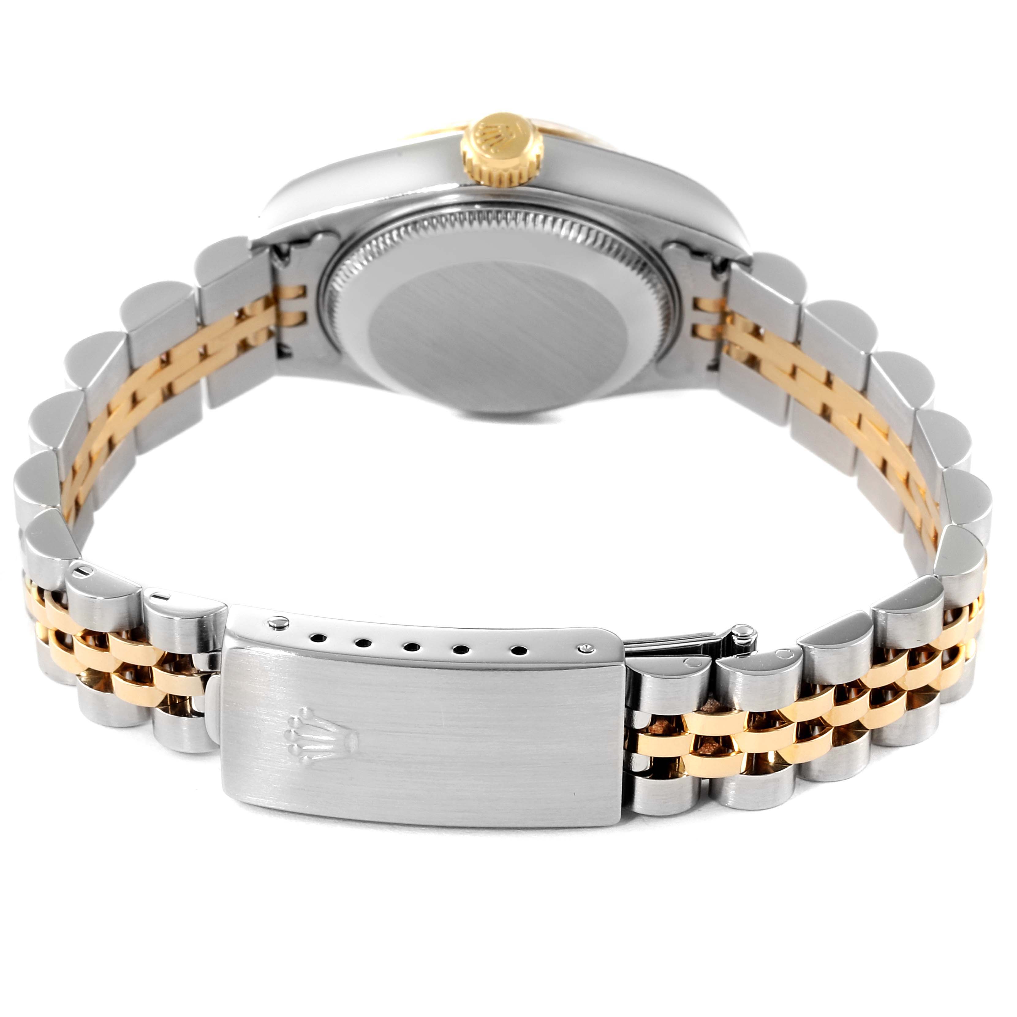 This image shows the back of the Rolex Datejust 79173 Women
s Steel and Gold (two tone) White Dial 79173 Women
s Steel and Gold (two tone) White Dial watch, highlighting its clasp and two-tone bracelet.
