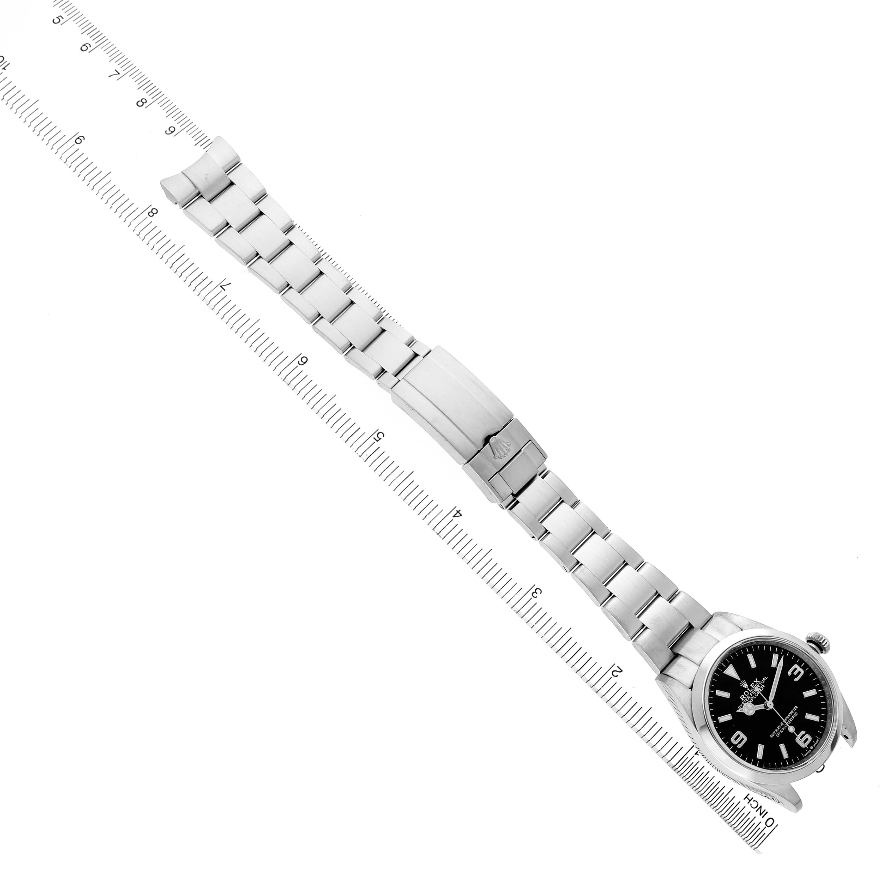 The Rolex Explorer 124270 Men's Stainless Steel Black Dial watch is shown from an overhead angle, displaying the full length of the watch, including the bracelet and clasp.