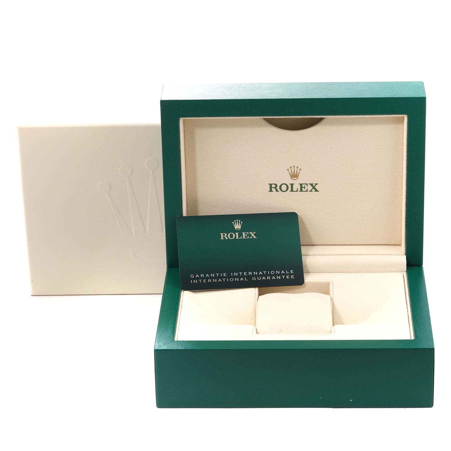The image shows the box and international guarantee card for a Rolex GMT-Master 126710 Men
s Stainless Steel Black Dial 126710 Men
s Stainless Steel Black Dial, with the box open and empty.