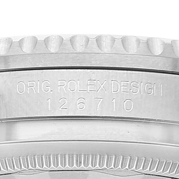 This image shows a close-up of the case side of the Rolex GMT-Master 126710 Men
s Stainless Steel Black Dial 126710 Men
s Stainless Steel Black Dial, highlighting the engraved model number "126710."