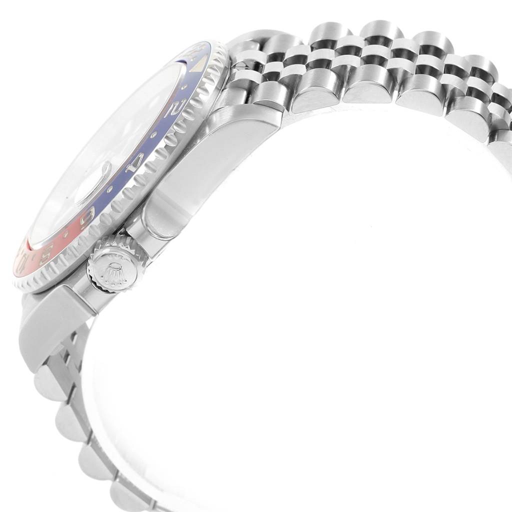 The image shows a side view of the Rolex GMT-Master 126710 Men
s Stainless Steel Black Dial 126710 Men
s Stainless Steel Black Dial watch, highlighting part of its bezel, crown, and bracelet.