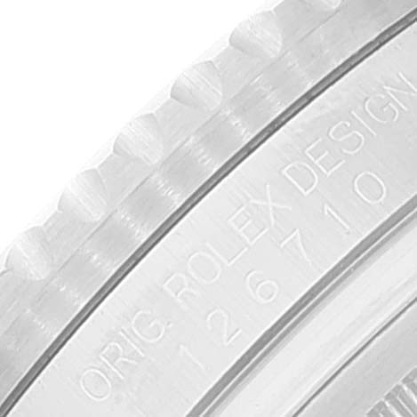 This image shows an engraved inner bezel of a Rolex GMT-Master 126710 Men's Stainless Steel Black Dial 126710 Men's Stainless Steel Black Dial watch with the model number 126710.