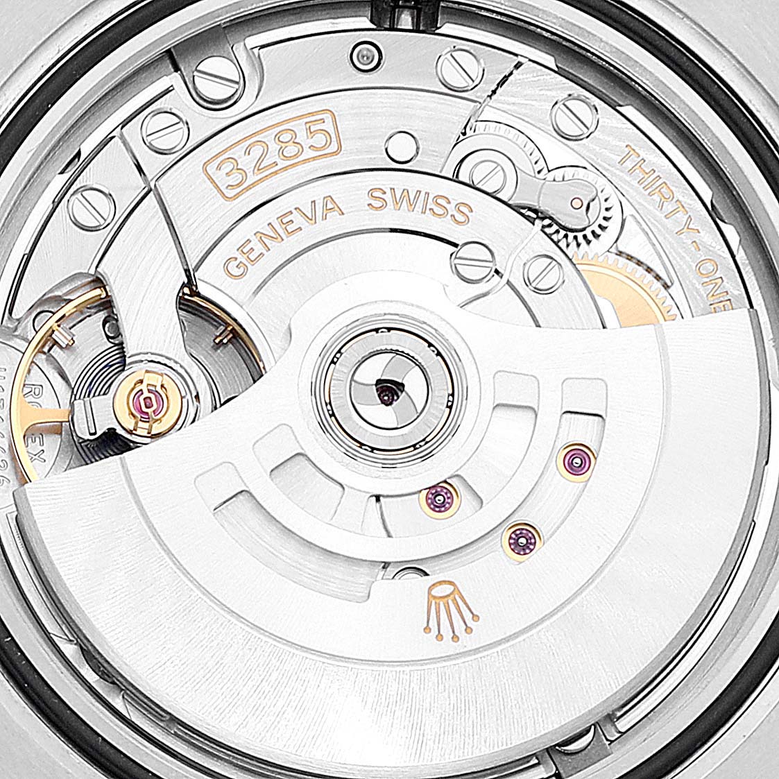 This image shows the intricate movement of a Rolex GMT-Master 126710 Men's Stainless Steel Black Dial 126710 Men's Stainless Steel Black Dial watch, featuring the caliber 3285 mechanism.