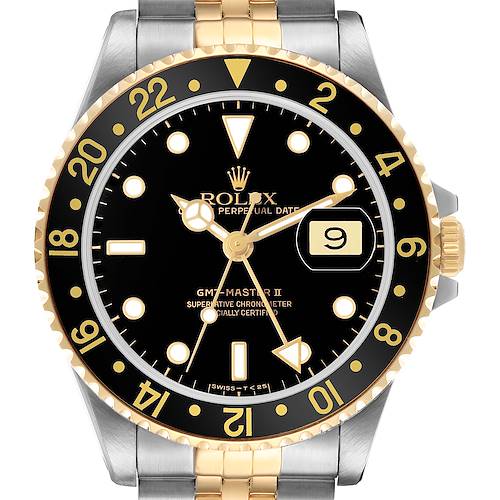 The image shows a front view of the Rolex GMT-Master 16713 Men's Steel and Gold (two tone) Black Dial II watch, featuring its black dial, gold bezel, and two-tone bracelet.