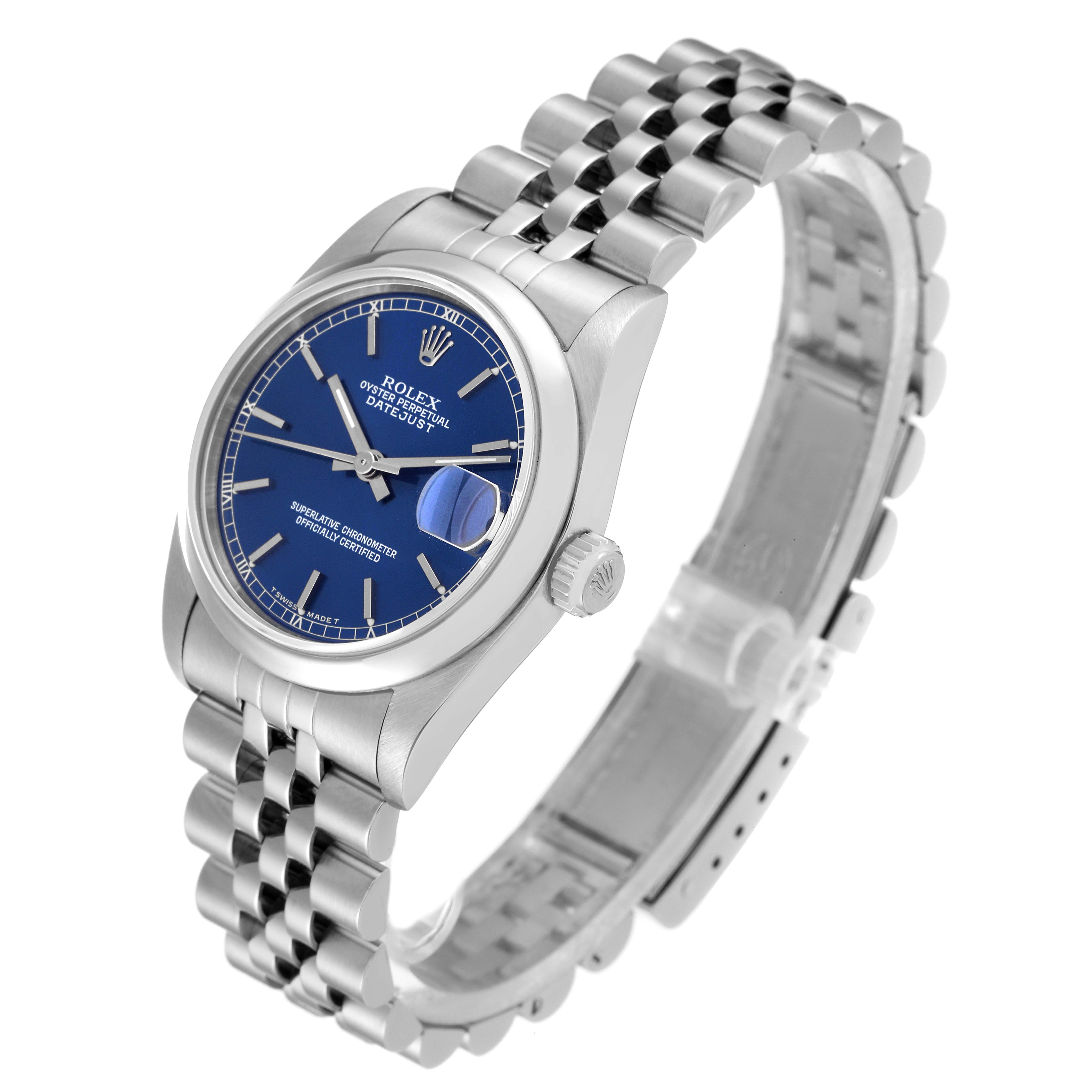 The image shows a Rolex Mid-Size 68240 Women
s Stainless Steel Blue Dial 68240 Women
s Stainless Steel Blue Dial Datejust watch at a three-quarter angle, highlighting its blue dial, bezel, crown, and Jubilee bracelet.